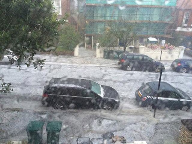 Photo taken from the twitter feed of @lukewteth with permission of flash flooding in Wilbury Gardens in Hove as storms hit