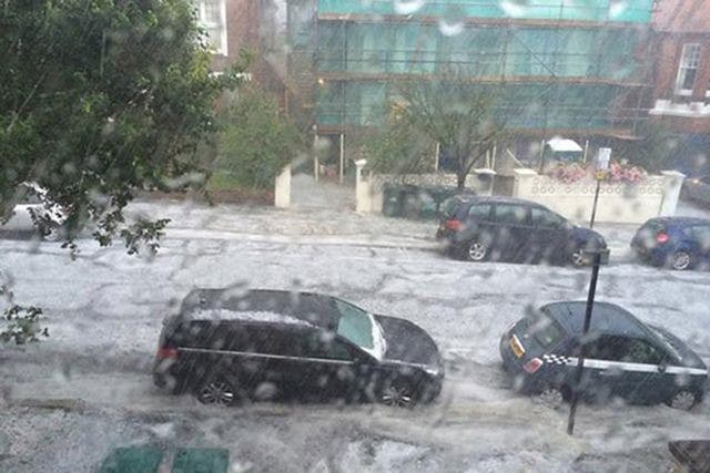 Photo taken from the twitter feed of @lukewteth with permission of flash flooding in Wilbury Gardens in Hove as storms hit