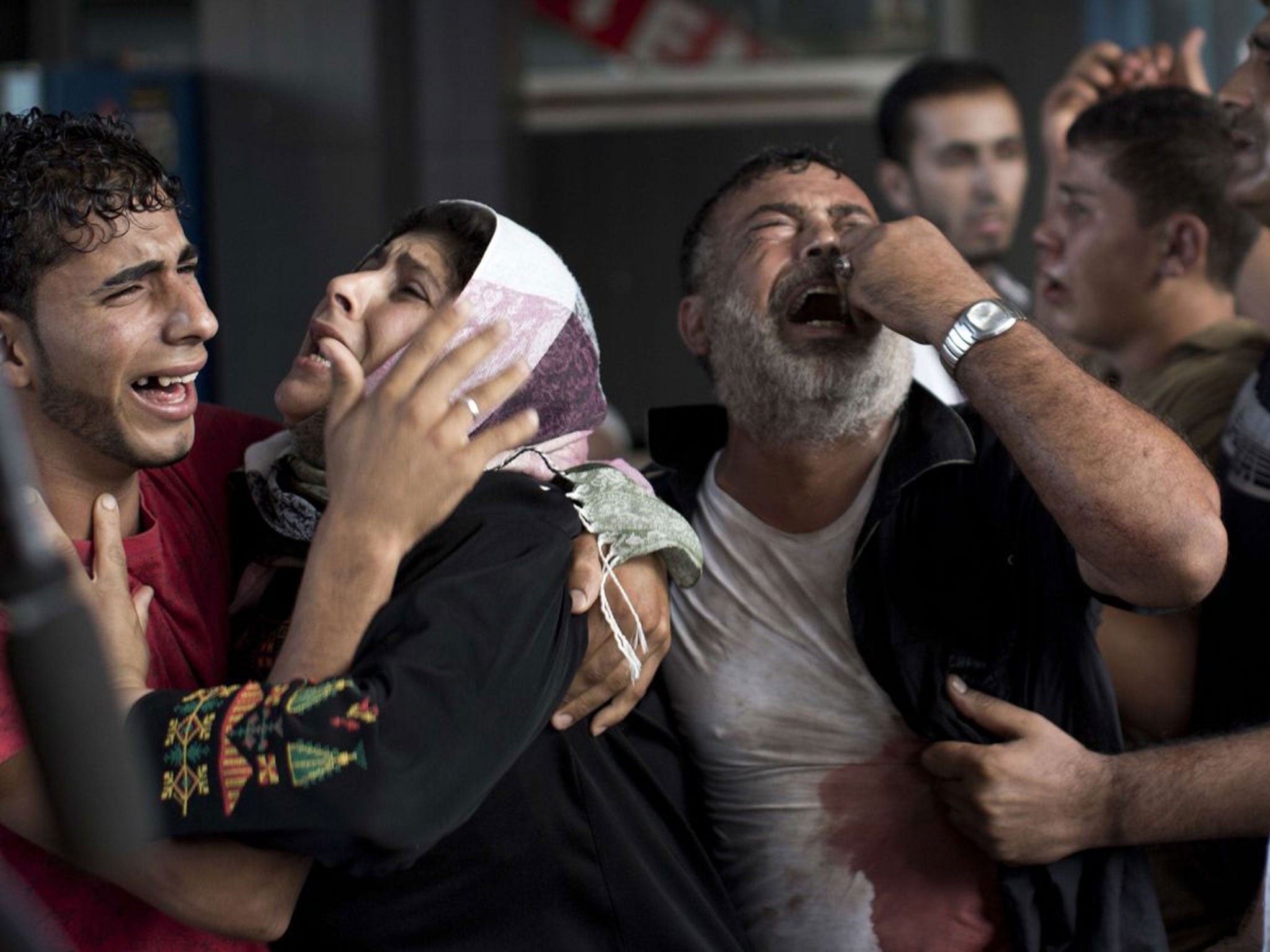 Mourners at Shifa Hospital: ‘Do the Israelis want to kill all our children?’ one woman asked