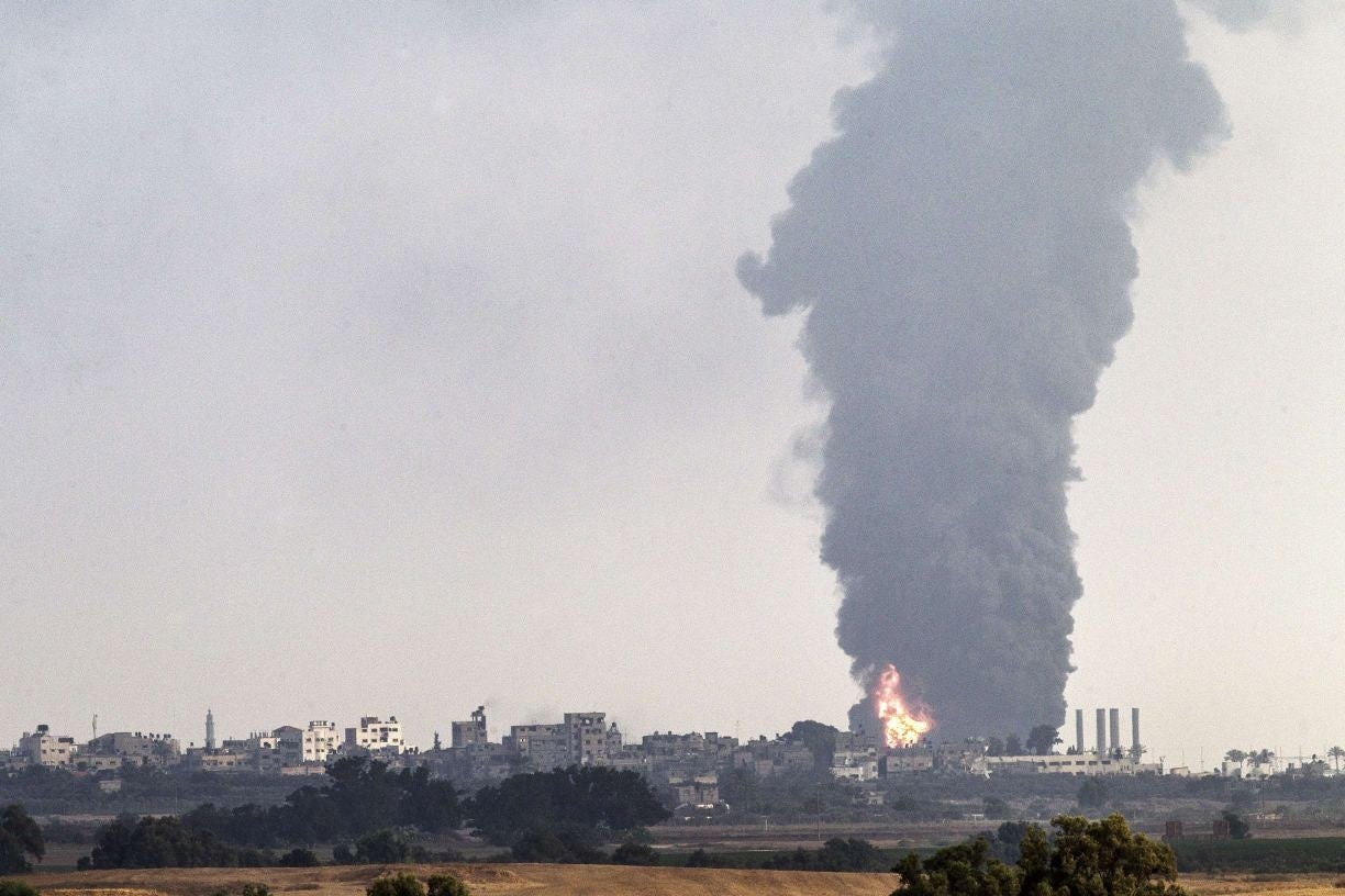 A picture taken from the southern Israeli Gaza border shows smoke billowing from a power plant in the coastal Palestinian enclave following an Israeli air strike