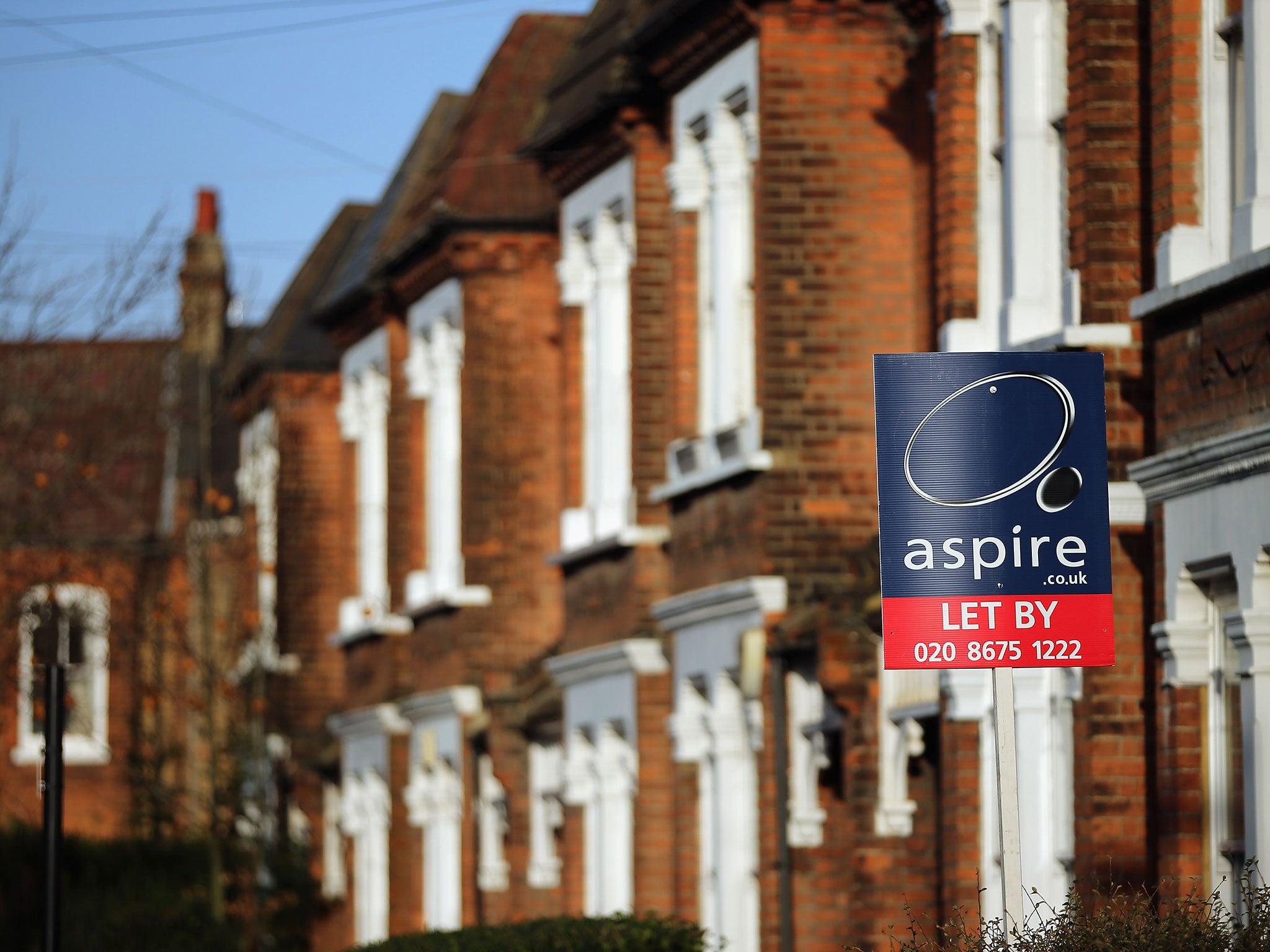 A general view of a To Let sign next to property near Clapham in London, England