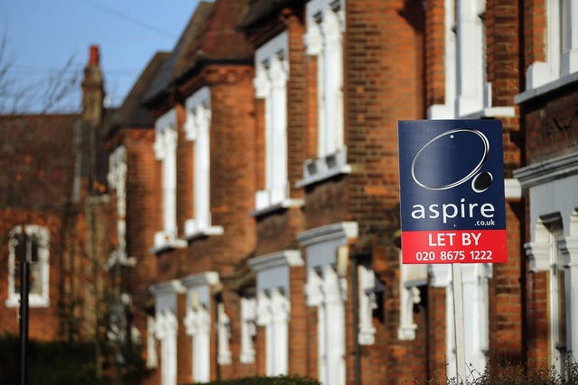 A general view of a To Let sign next to property near Clapham in London, England