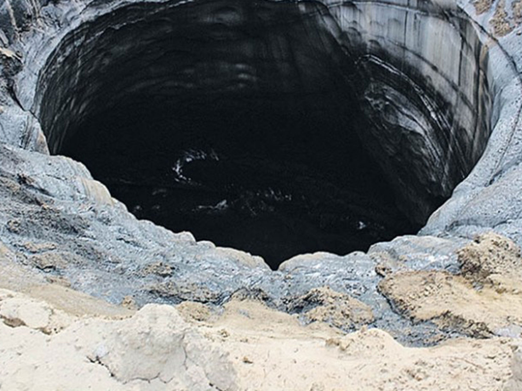 A picture The Siberian Times claims shows a 15 metre crater in the Taz district, near the village of Antipayuta