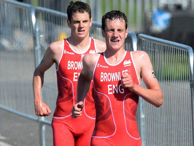 Alistair and Jonathan Brownlee on their way to winning medals in the mens triathlon 
