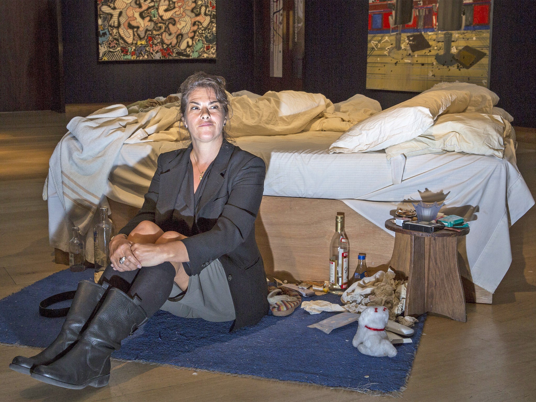 Tracy Emin sits in front of her iconic 1998 piece (Getty)