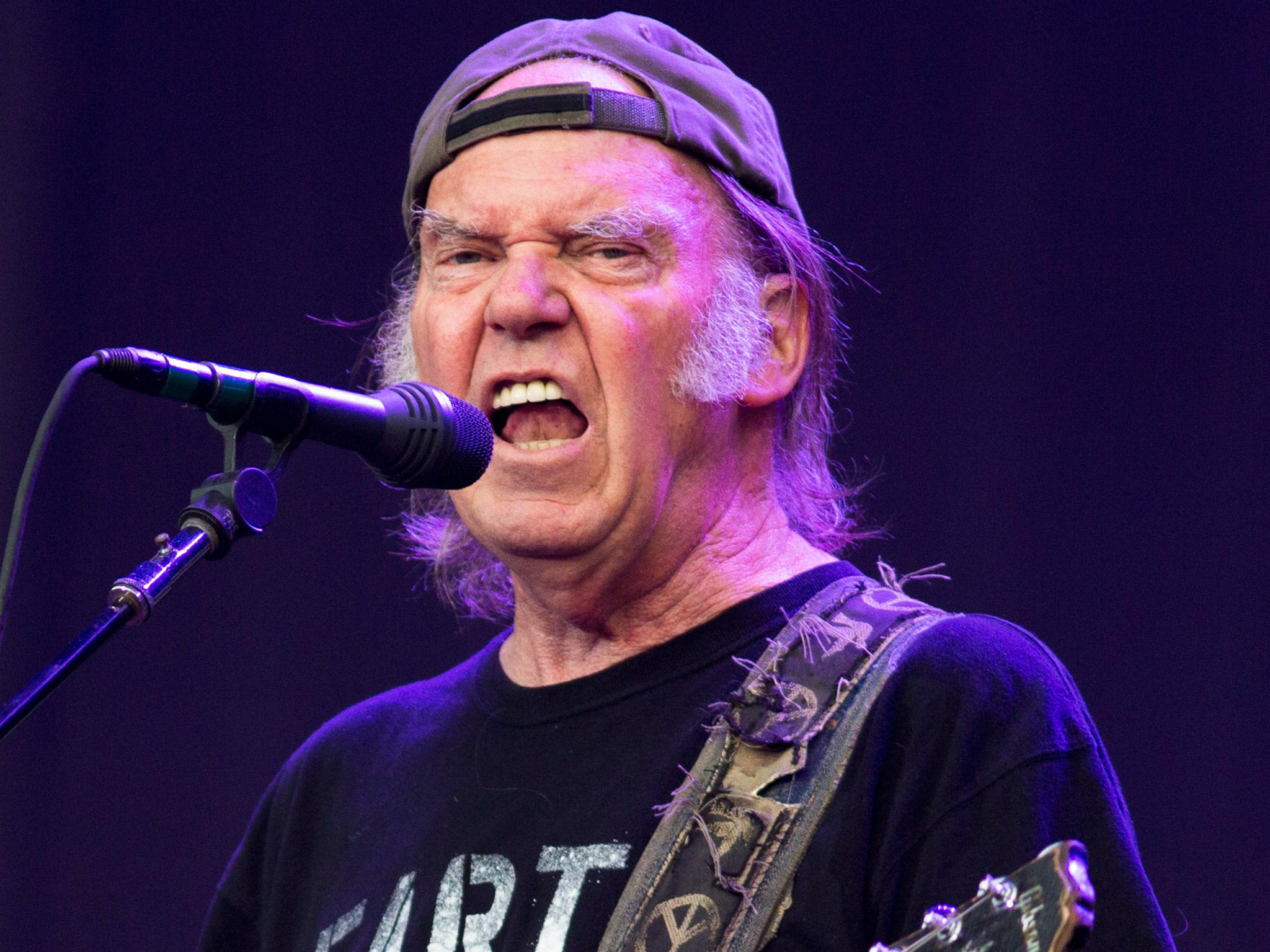 Neil Young performing at Hyde Park, London, earlier this month