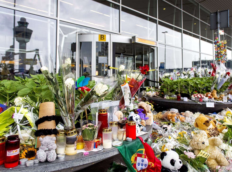 Flowers for the victims of flight MH17 at Schiphol Airport, near Amsterdam