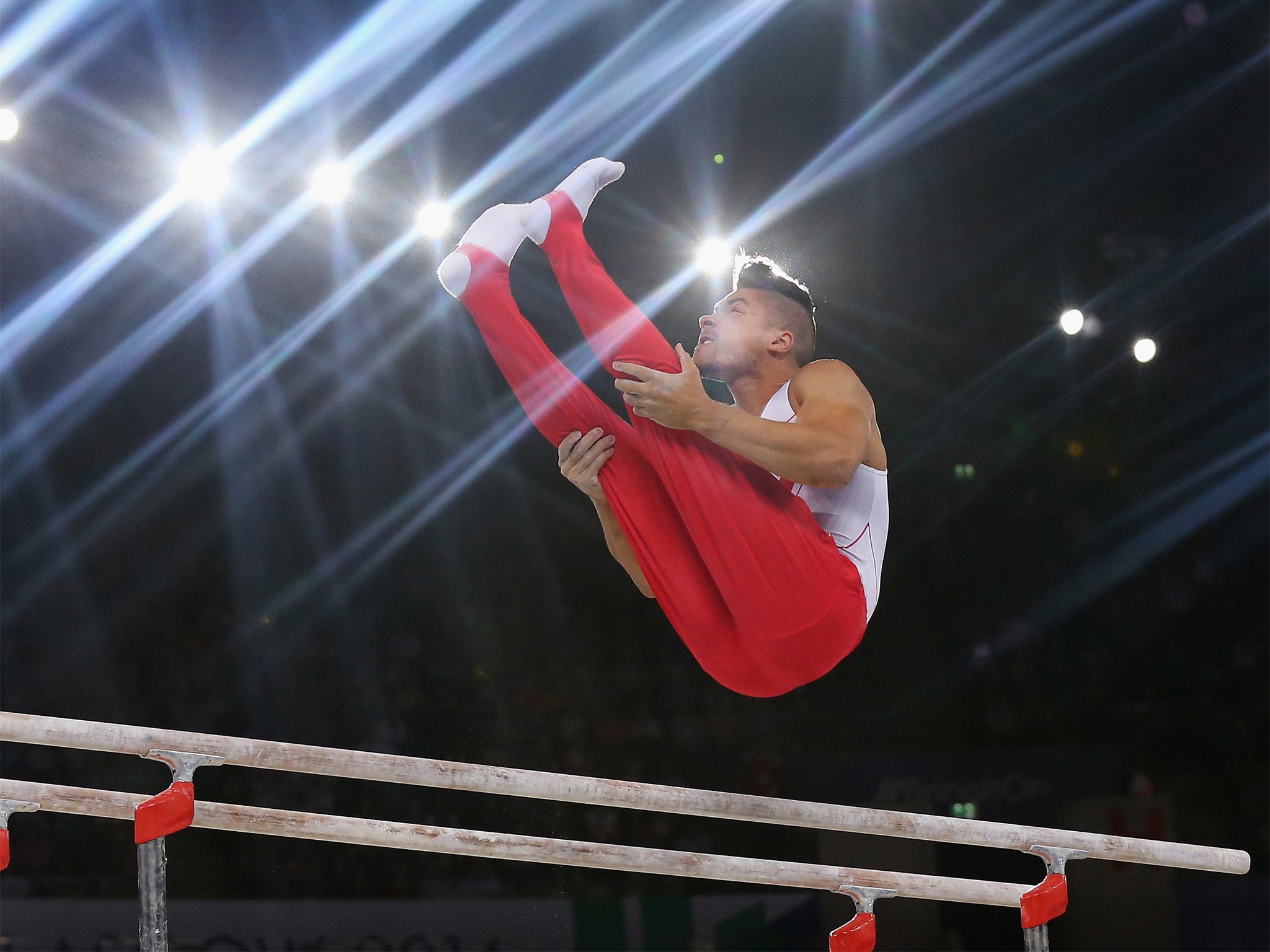 Louis Smith competing in the parallel bars