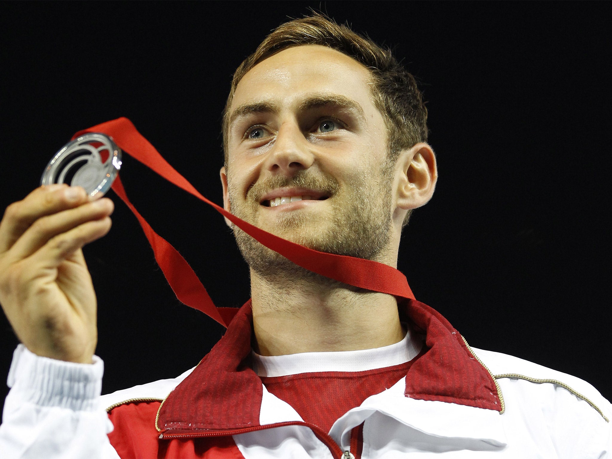 Ashley Bryant poses with his silver medal (Getty)