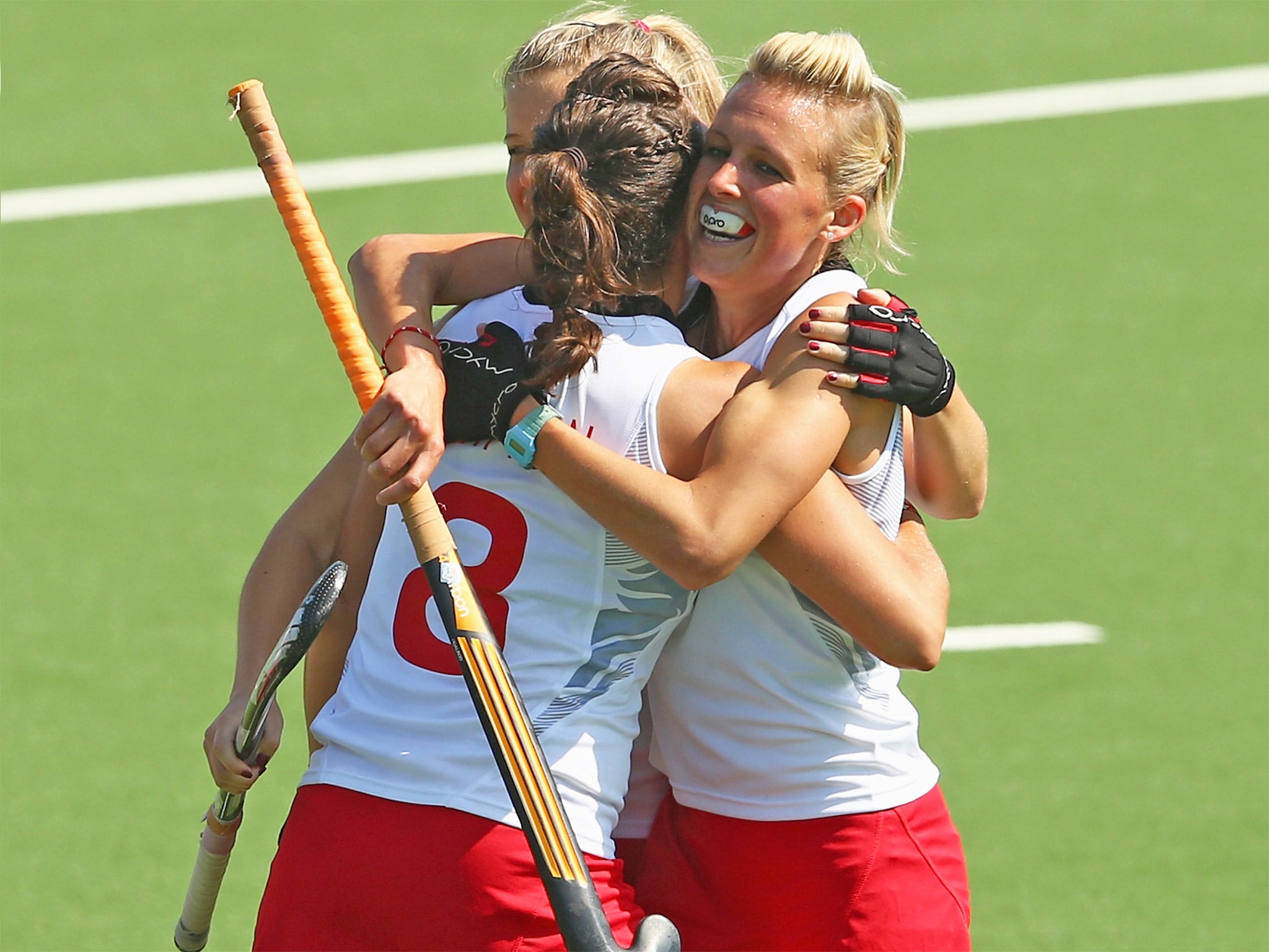 England’s Alex Danson (right) opened the scoring in their victory over Scotland
