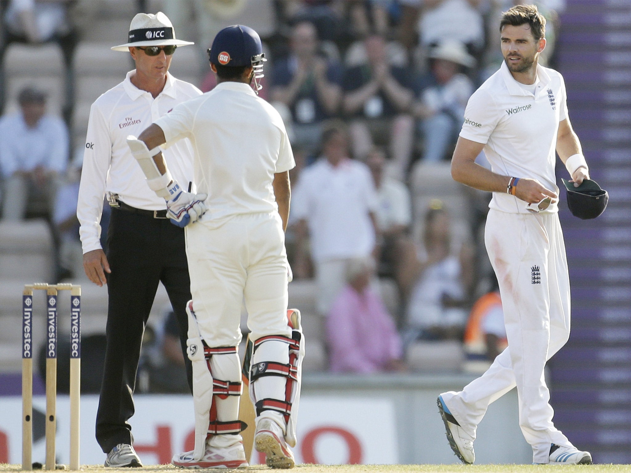 James Anderson exchanges words with the India batsman Ajinkya Rahane at the end of play