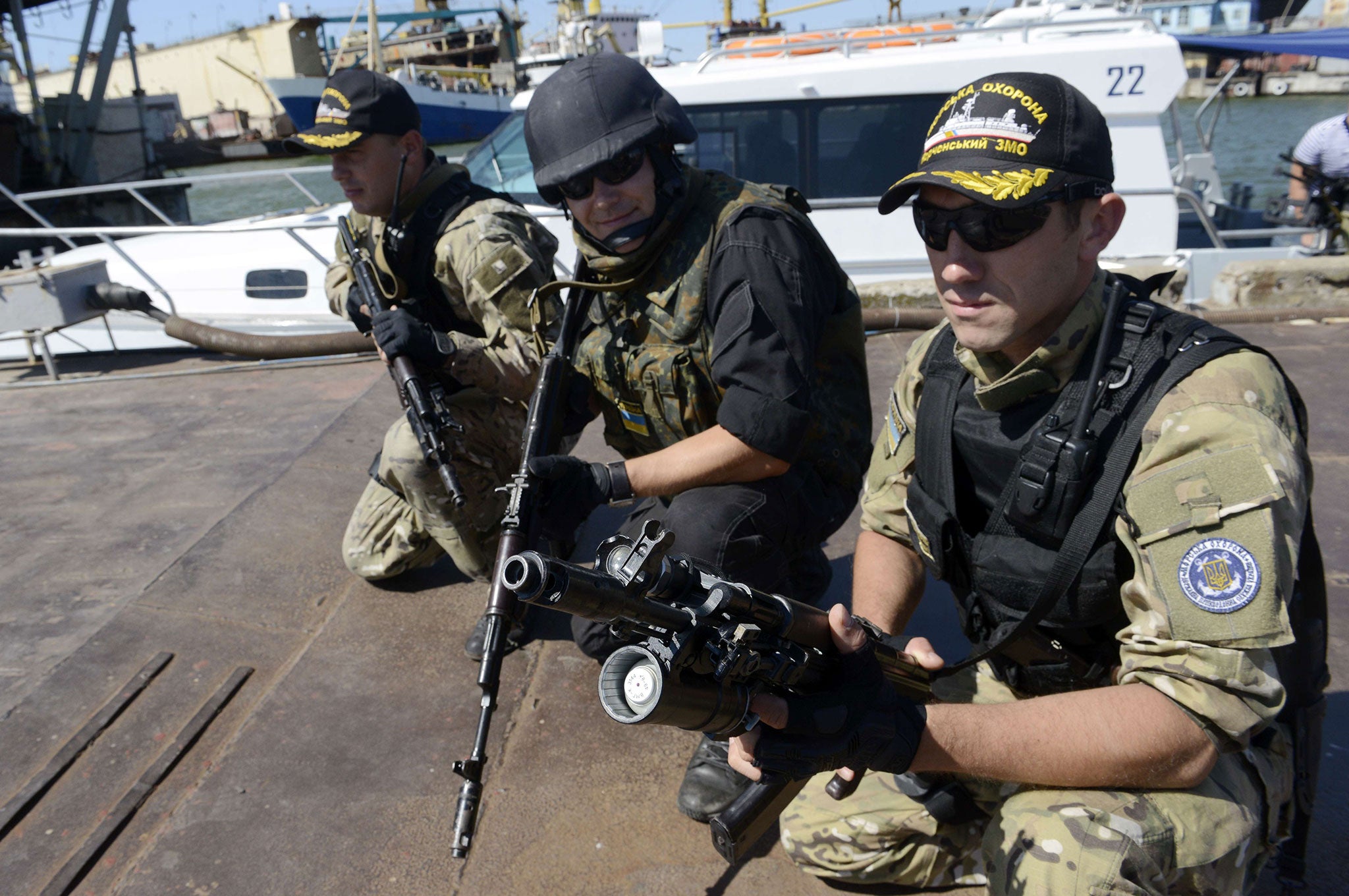 Service men of the maritime security of the State Border Service of Ukraine prepare to patrol the Tahanroz'ka gulf of the sea of Azov, off the southern Ukrainian city of Mariupol to prevent illegal entry of armed groups and smuggling of weapons from nearb