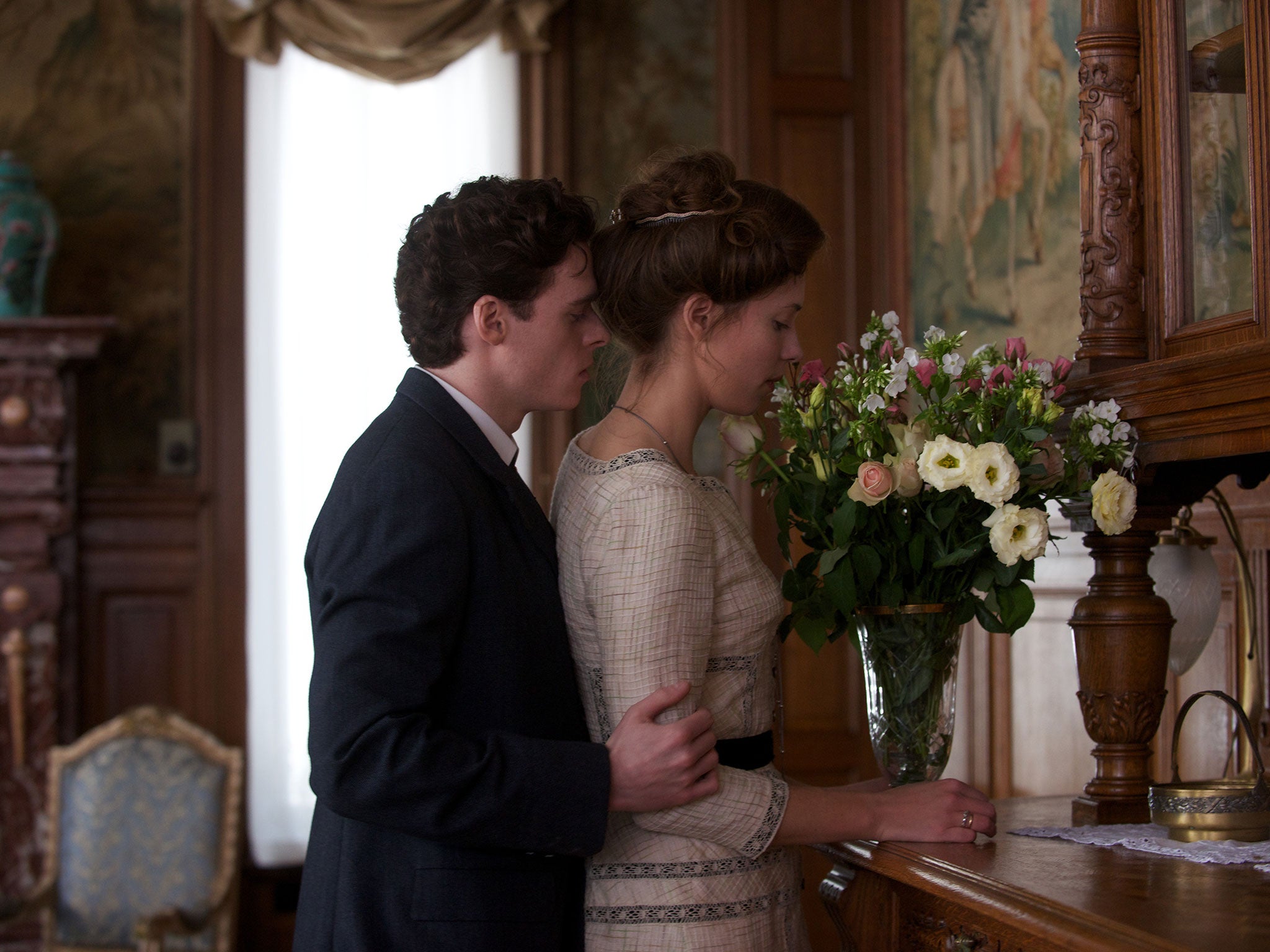 Dressed for repression: Richard Madden and Rebecca Hall in A Promise