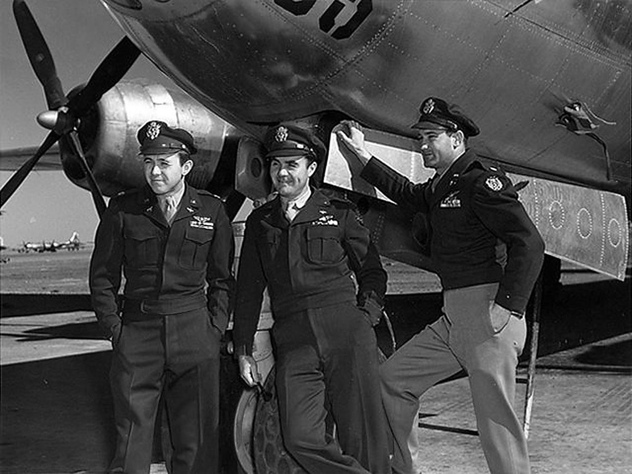 The crew of ‘Enola Gay’ after their mission to Hiroshima,
left to right, Van Kirk, Paul Tibbets and Thomas Ferebee