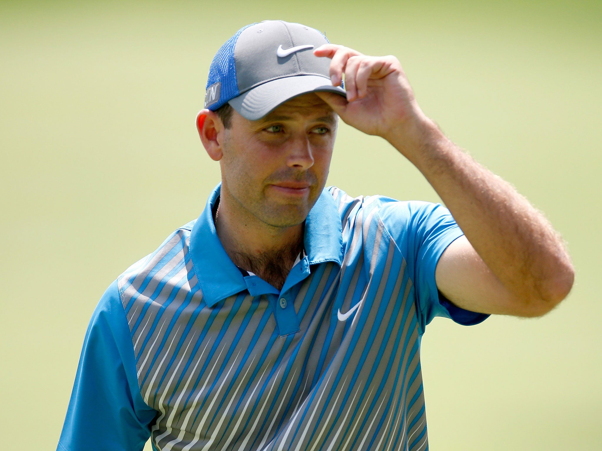 Charl Schwartzel (pictured) and Ryan Moore shot first-round scores of five under par yesterday