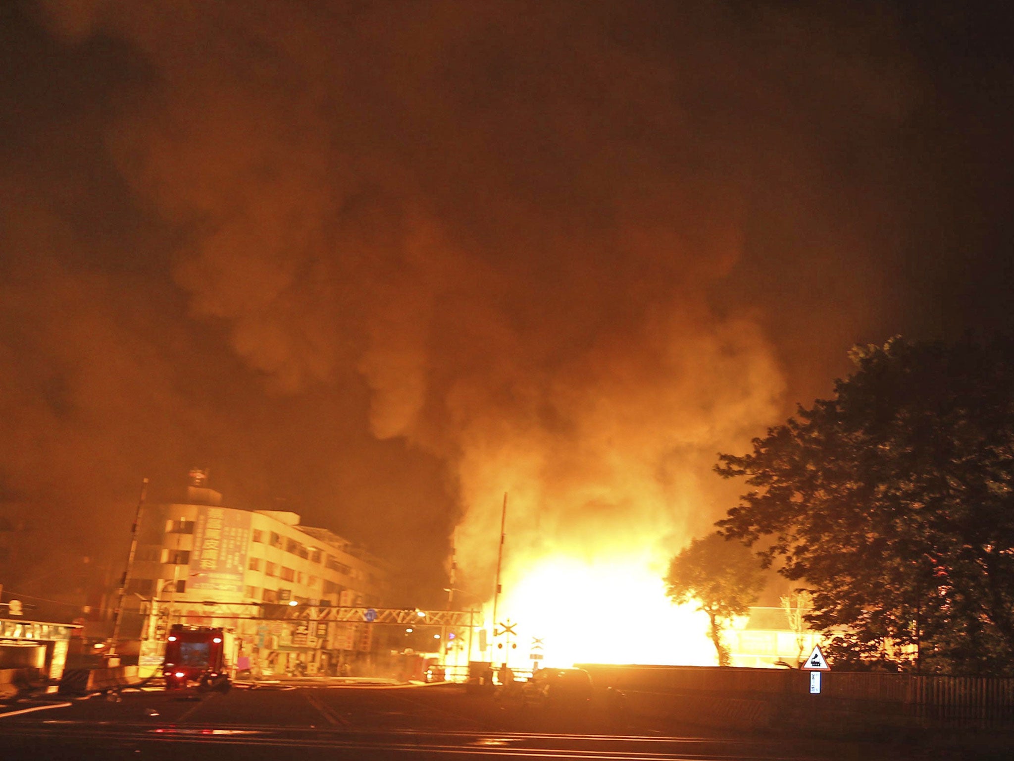 Flames from an explosion from an underground gas leak in the streets of Kaohsiung, Taiwan