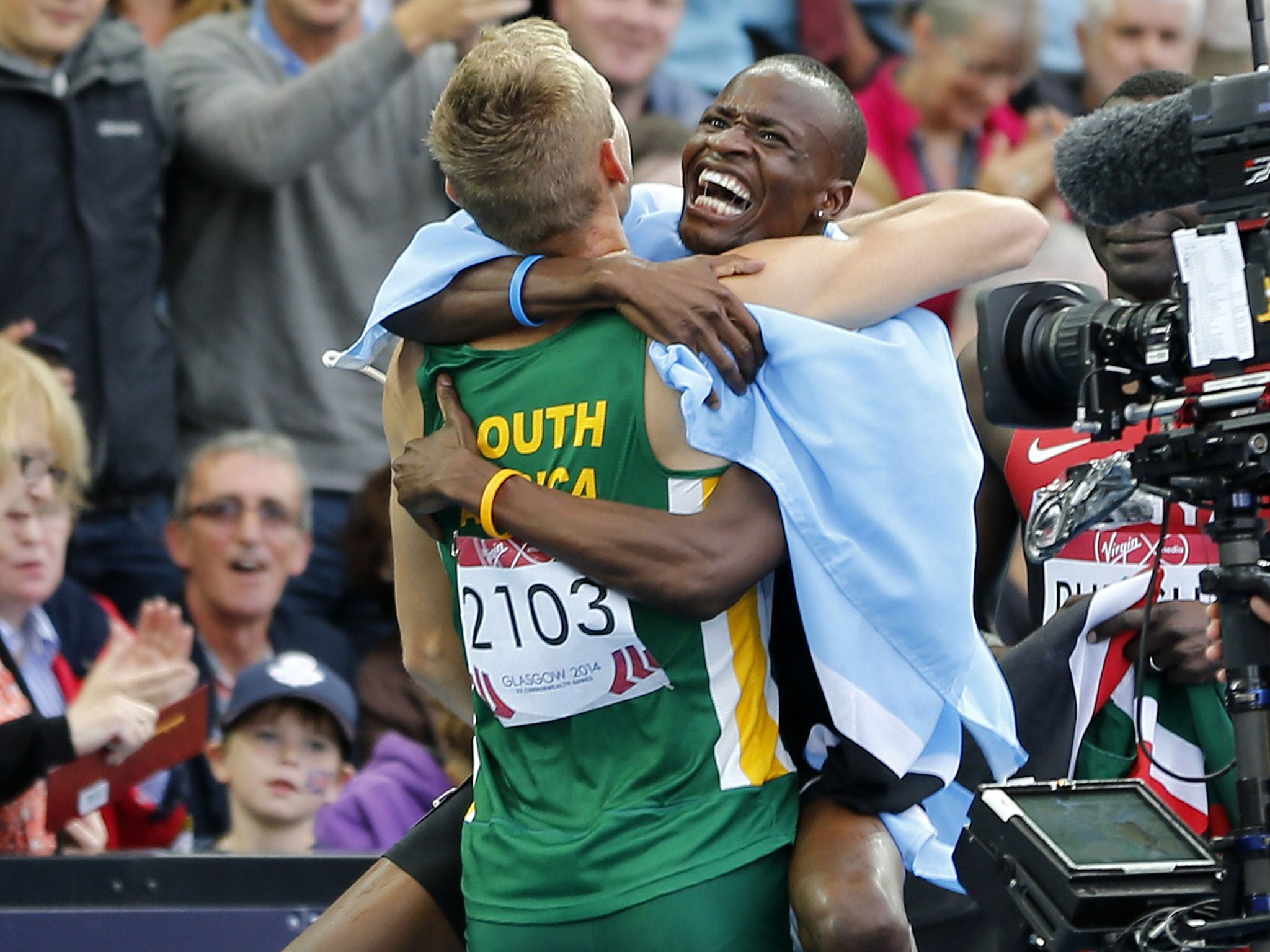 Nijel Amos (right) celebrates with bronze medallist Andre Olivier, who is also his training partner