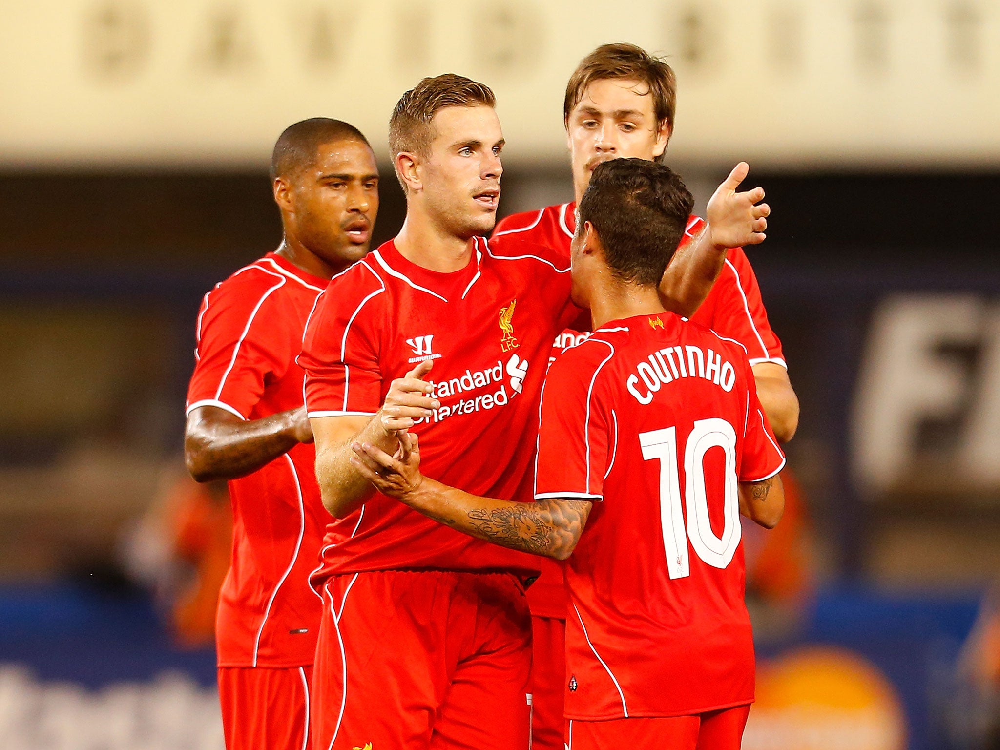 Jordan Henderson celebrates scoring for Liverpool against Manchester City in the International Champions Cup in New York