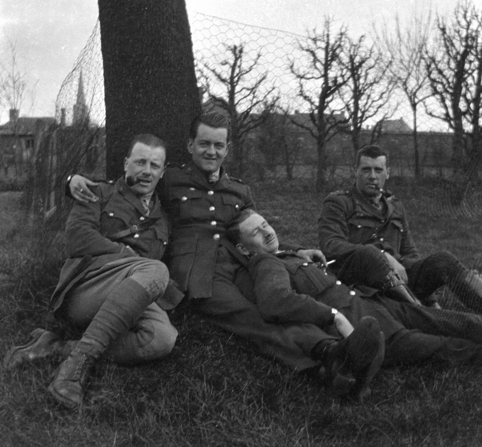 Lt Morgan (on far left, with pipe) with fellow officers, 'somewhere in France'