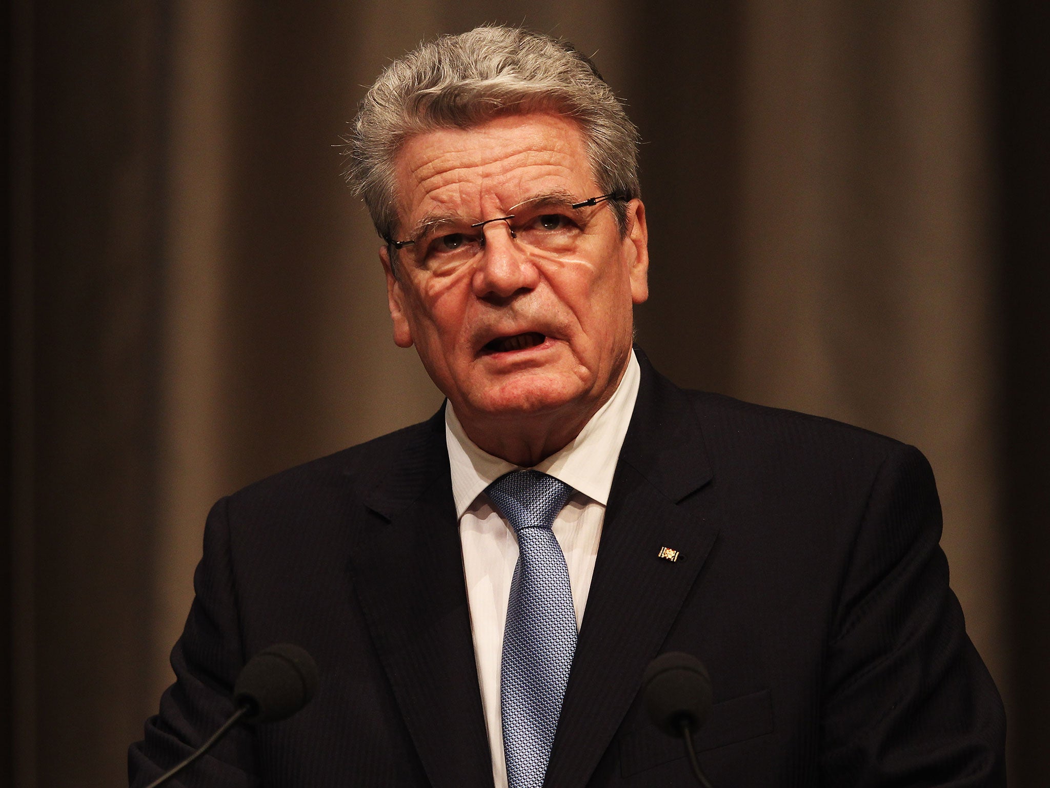 Germany’s President Joachim Gauck will clasp the hand of his French counterpart, François Hollande during the ceremony