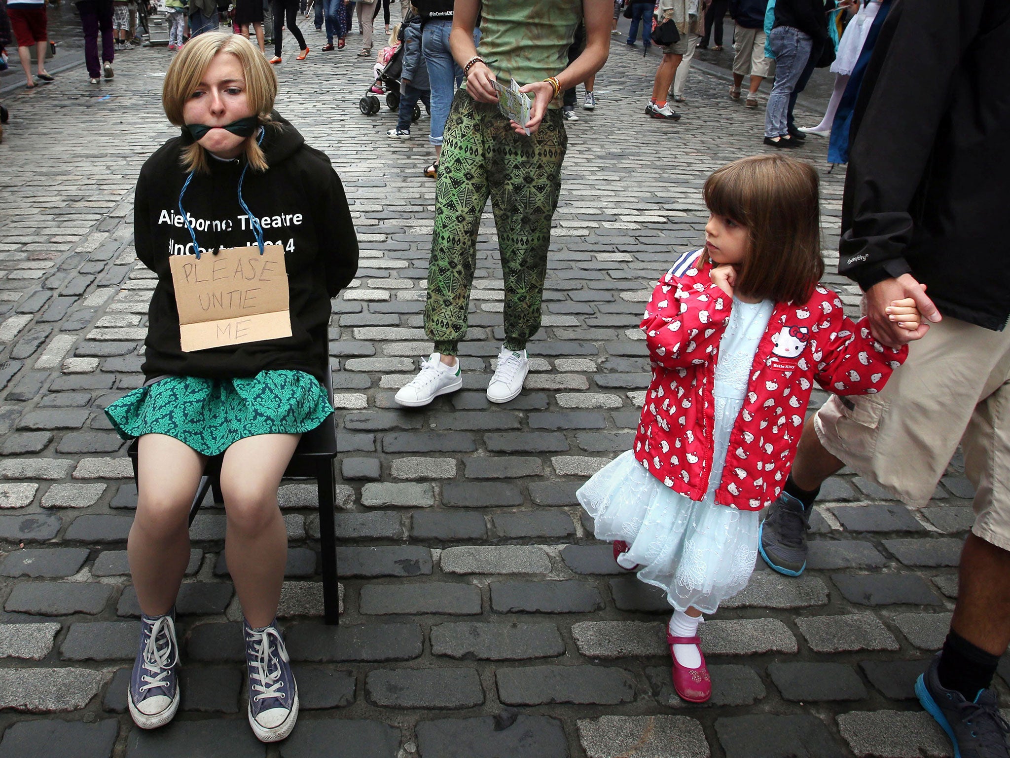 A performer on the Royal Mile on the first day of the festival