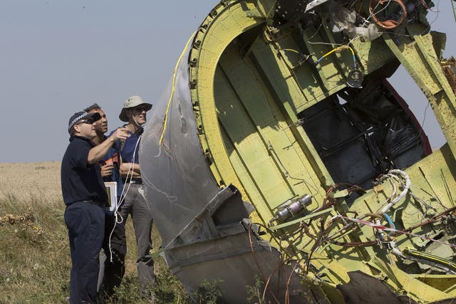 International experts examine wreckage yesterday