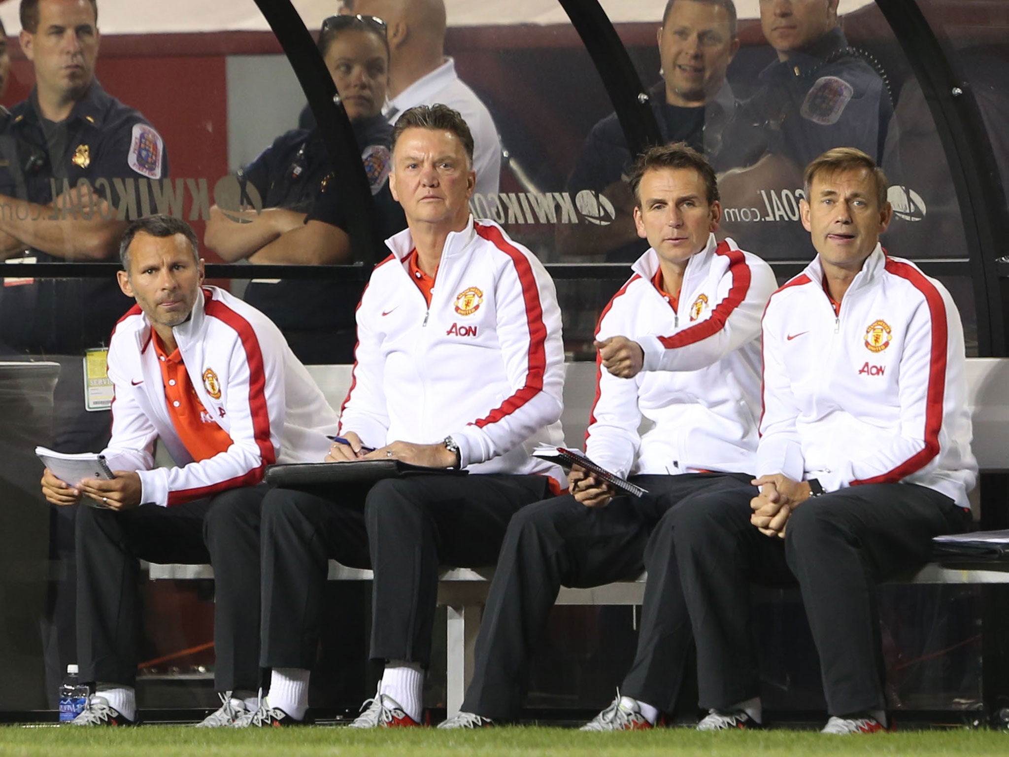 Louis van Gaal watches his Manchester United squad from the dug-out during the pre-season win over Roma