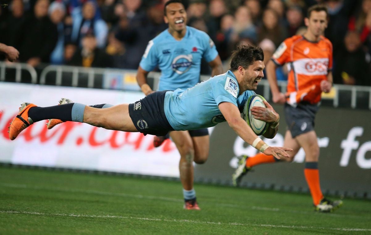 Adam Ashley-Cooper dives over for a try for the Waratahs in the 33-32 victory over the Crusaders to win the Super Rugby title