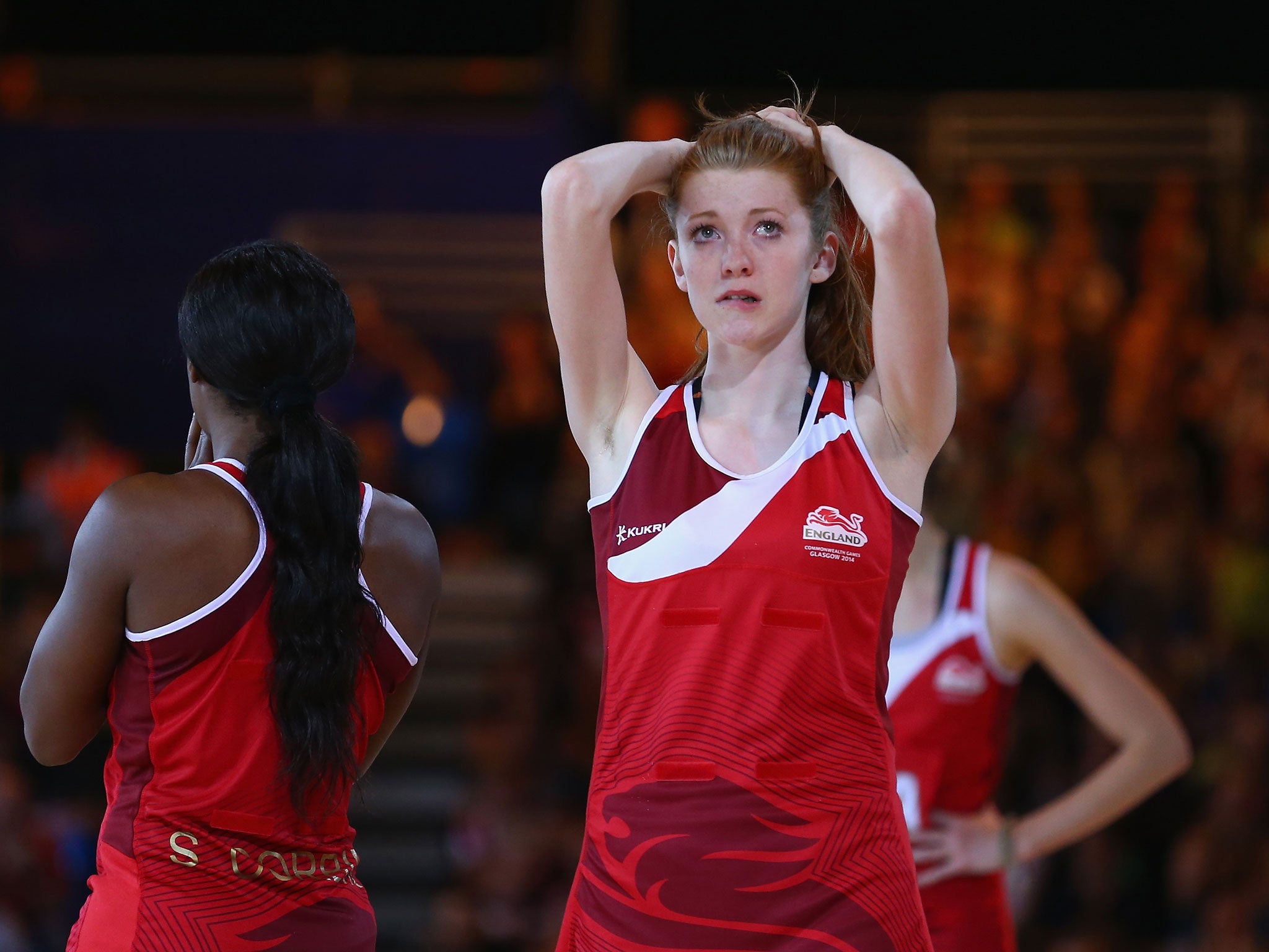 Helen Housby of England is dejected after New Zealand defeated England in the netball semi final