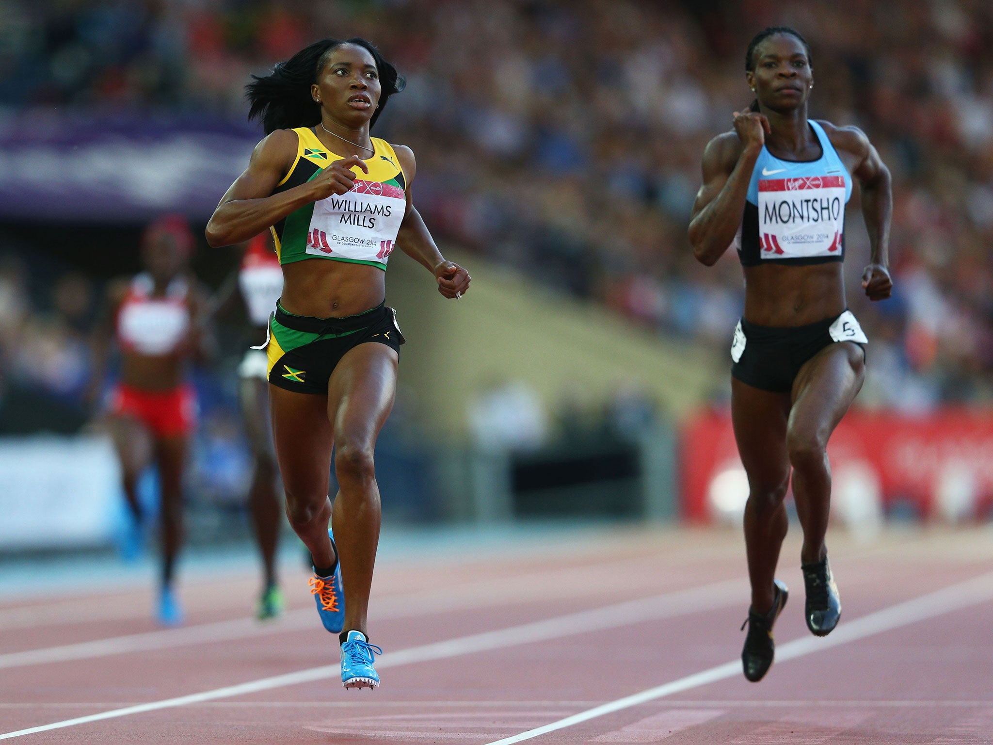 Novlene Williams-Mills of Jamaica and Amantle Montsho of Botswana compete in the Women's 400 metres