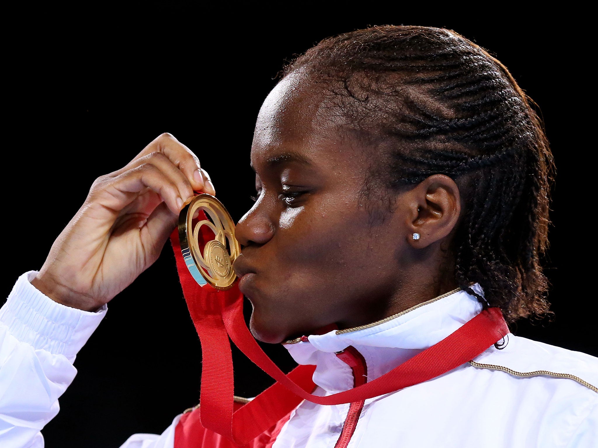 Nicola Adams kisses her Commonwealth Games gold medal