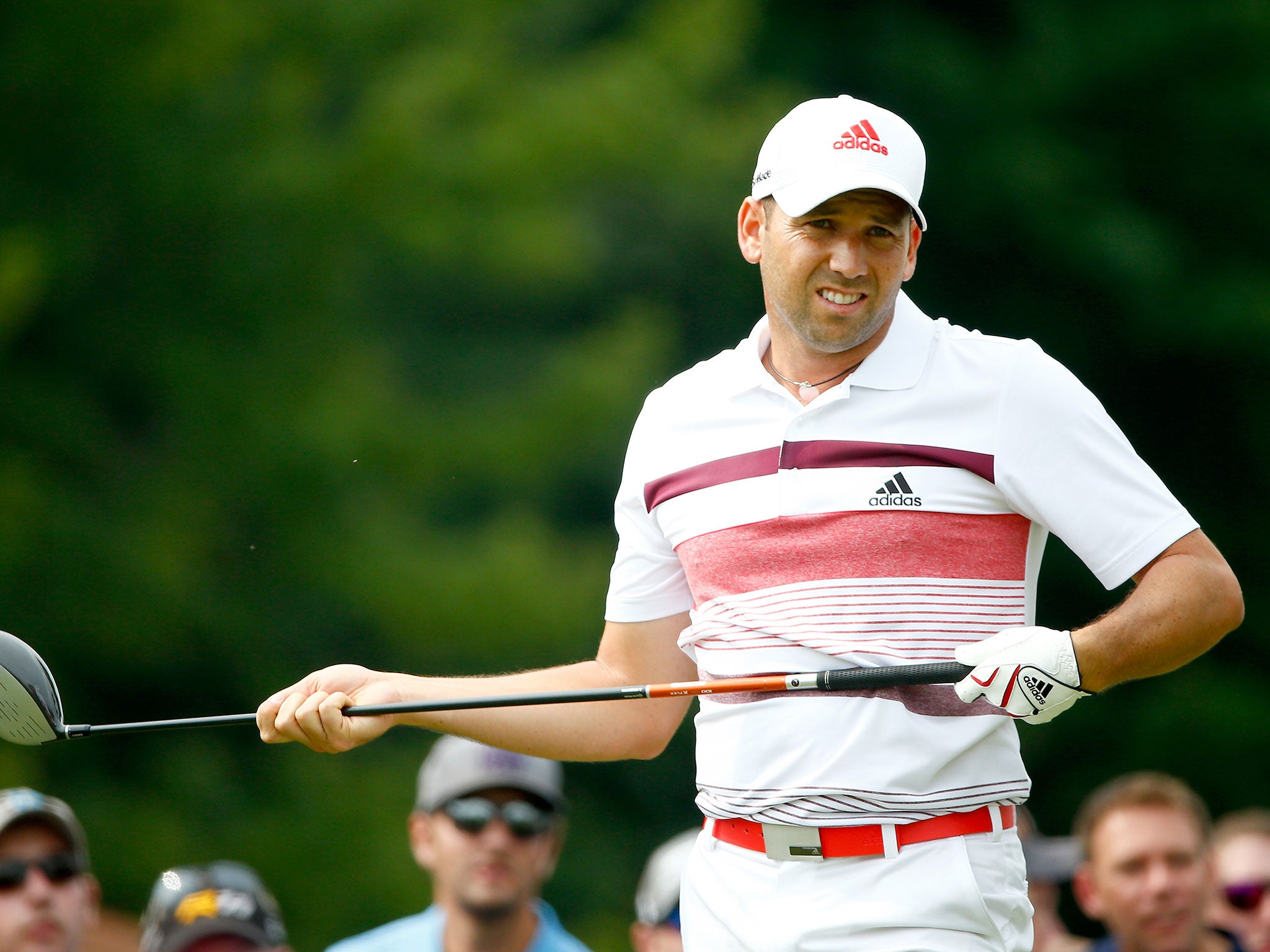 Sergio Garcia led by five shots on 14-under-par after 15 holes of his third round when weather intervened
