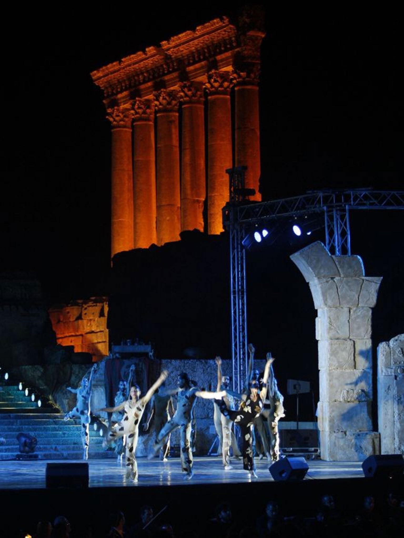 Performers in front of the temple ruins