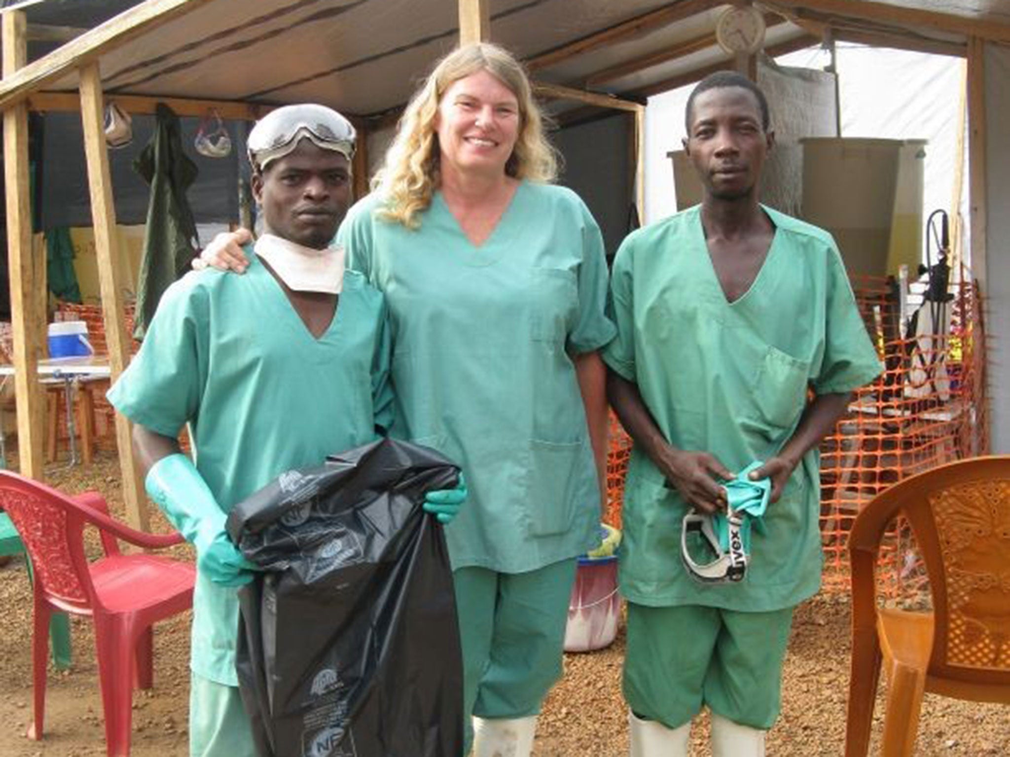 Cokie Van Der Velde, centre, with colleagues – before Ebola struck