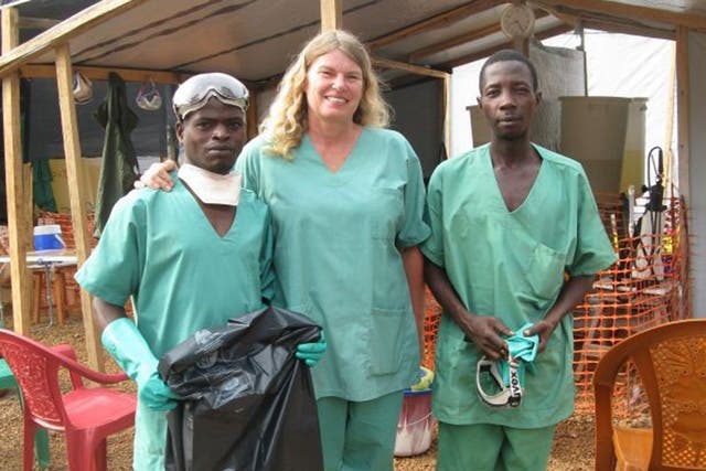 Cokie Van Der Velde, centre, with colleagues – before Ebola struck