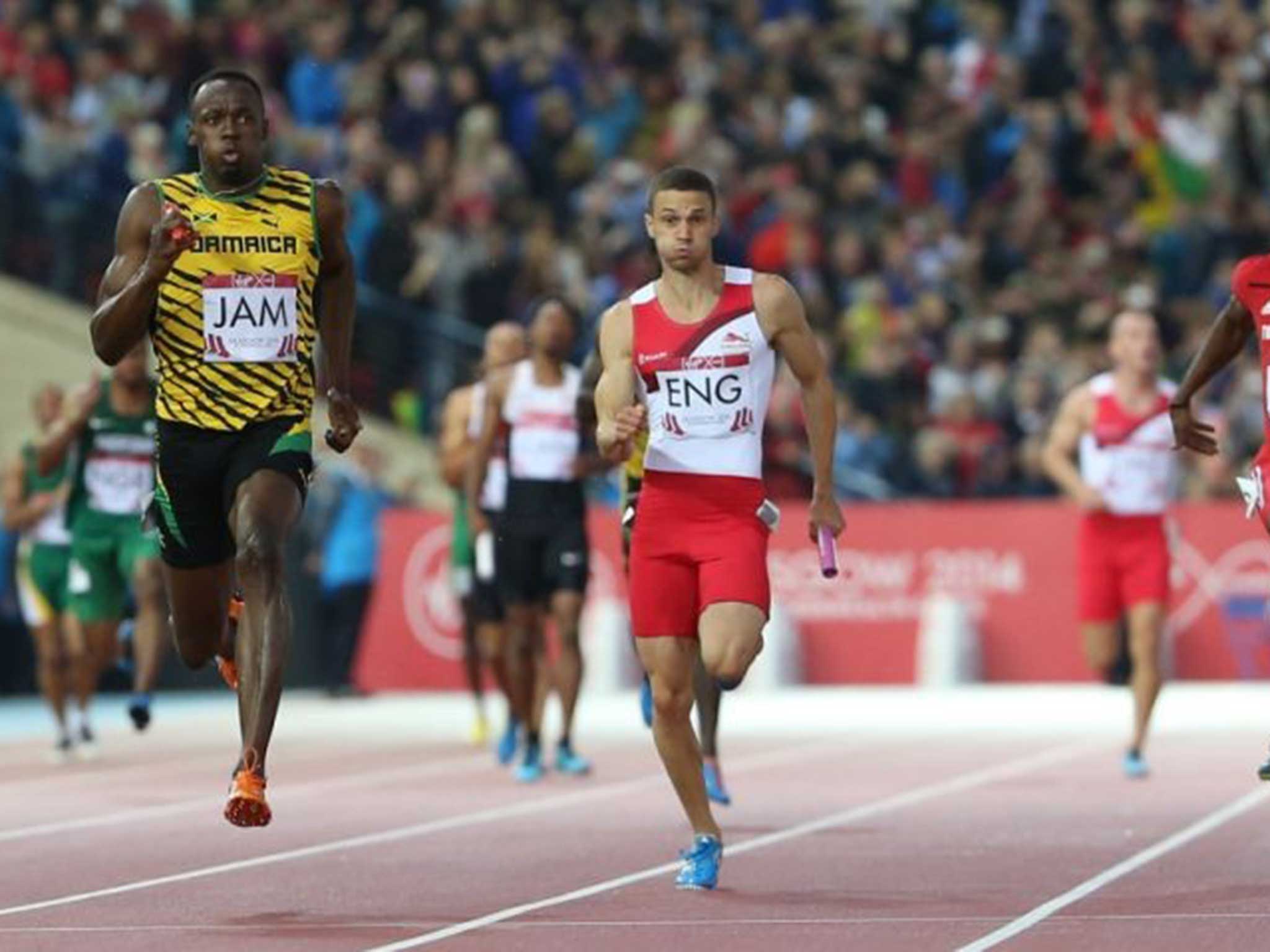 Out in front: Bolt powers Jamaica to victory in the anchor leg of the 4x100m