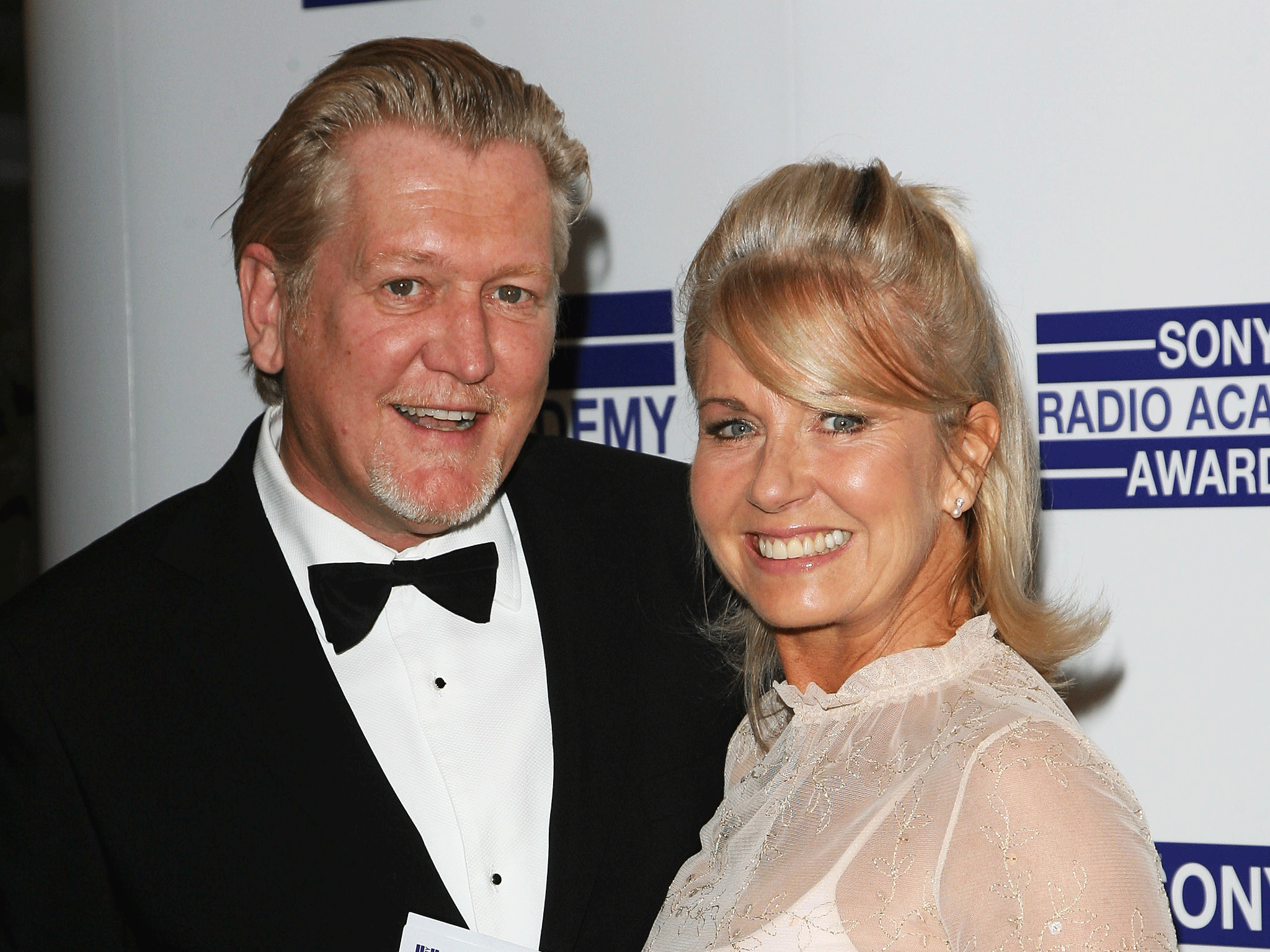 Former Radio One DJ Mike Smith, who has died aged 59, with wife Sarah Greene.
