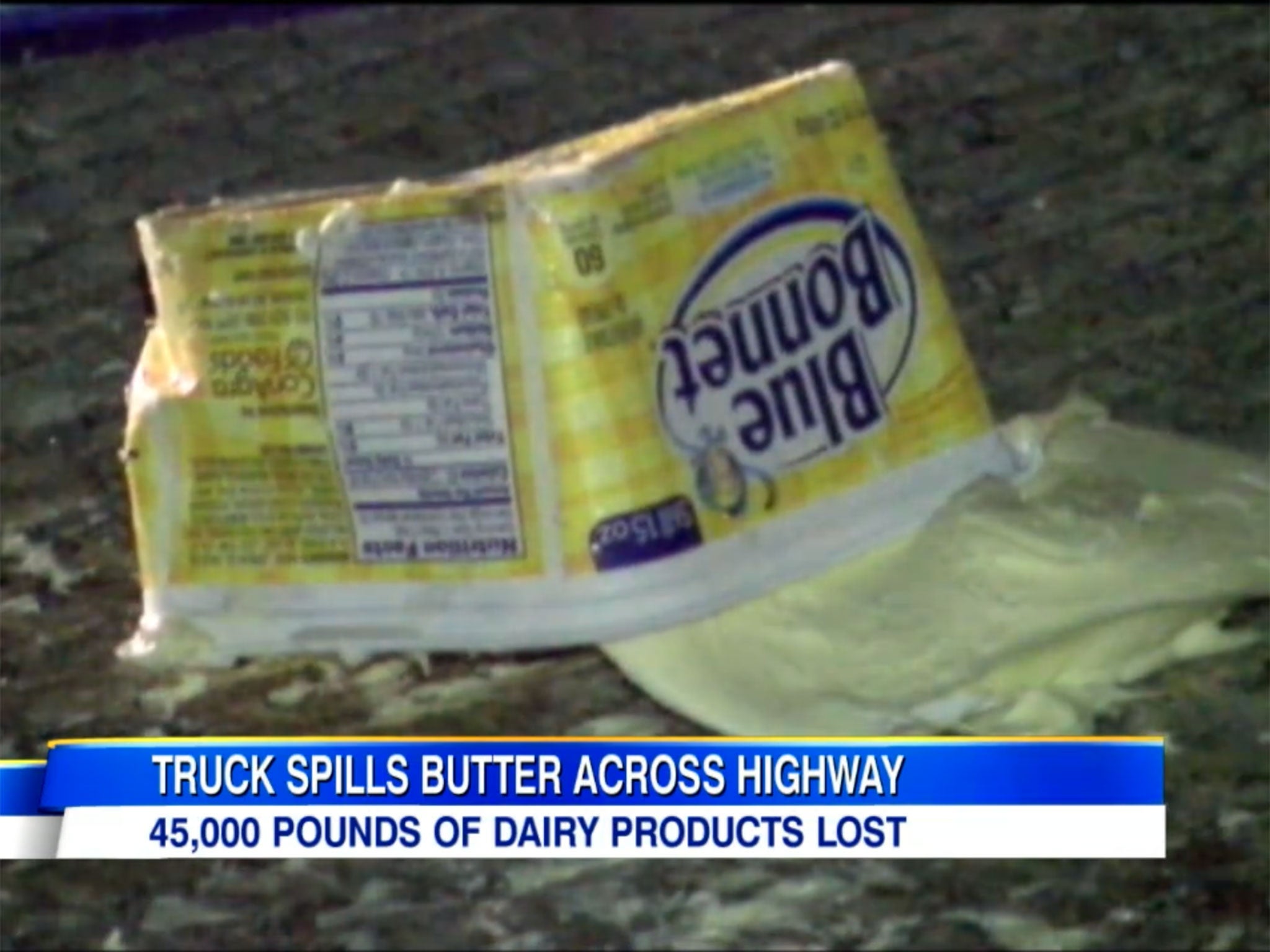 Around 45,000 pounds of butter, margarine and whipped cream tins spilled out of the truck onto the Interstate in Indianapolis, US.
