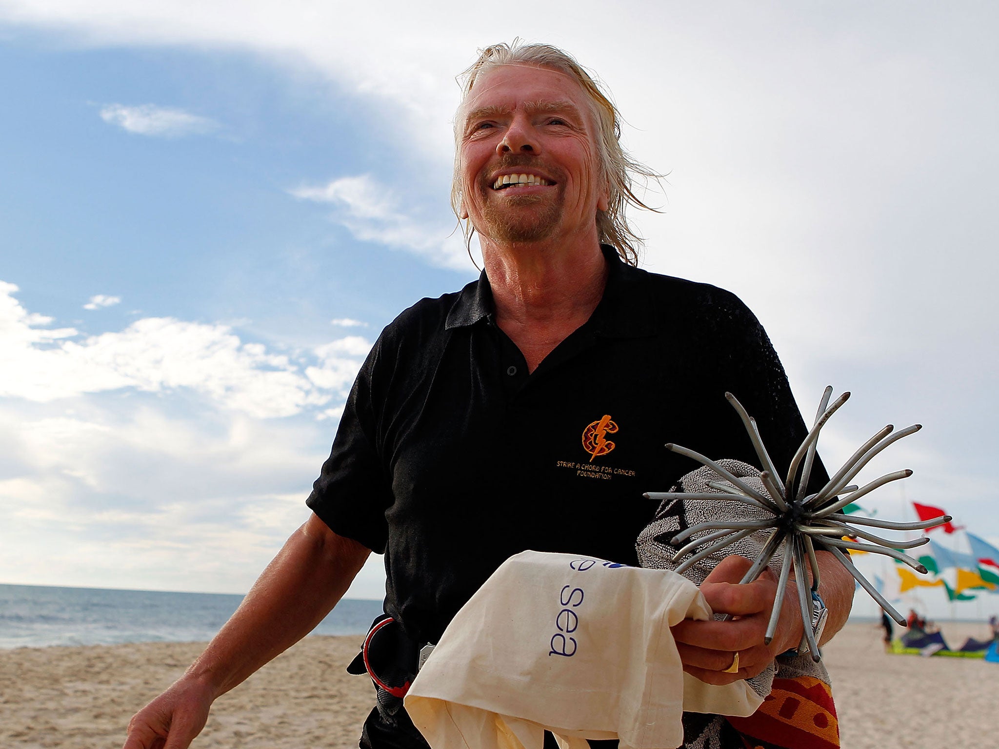 Richard Branson said children 'may well learn more [on family holidays] than they ever could in a classroom'