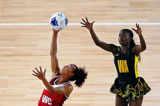 England’s Serena Guthrie (above left) and Jamaica’s Khadijah Williams compete for the ball in the bronze medal match