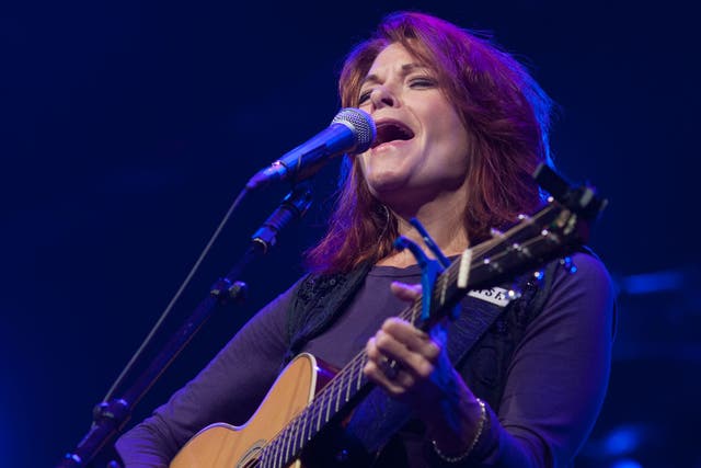 Rosanne Cash, the oldest daughter of Johnny, performing