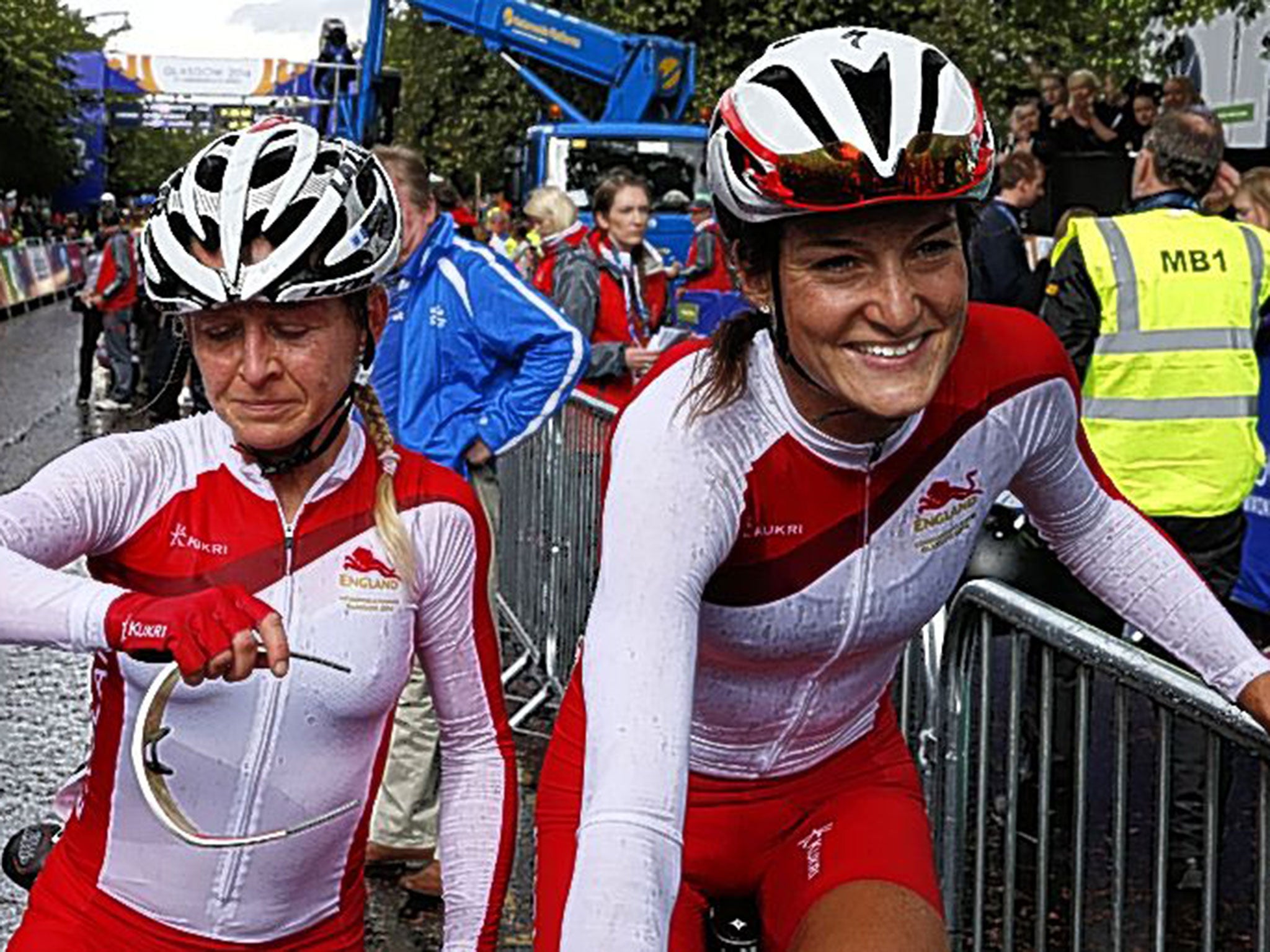 Lizzie Armitstead (right) beams after her victory beside Emma Pooley
