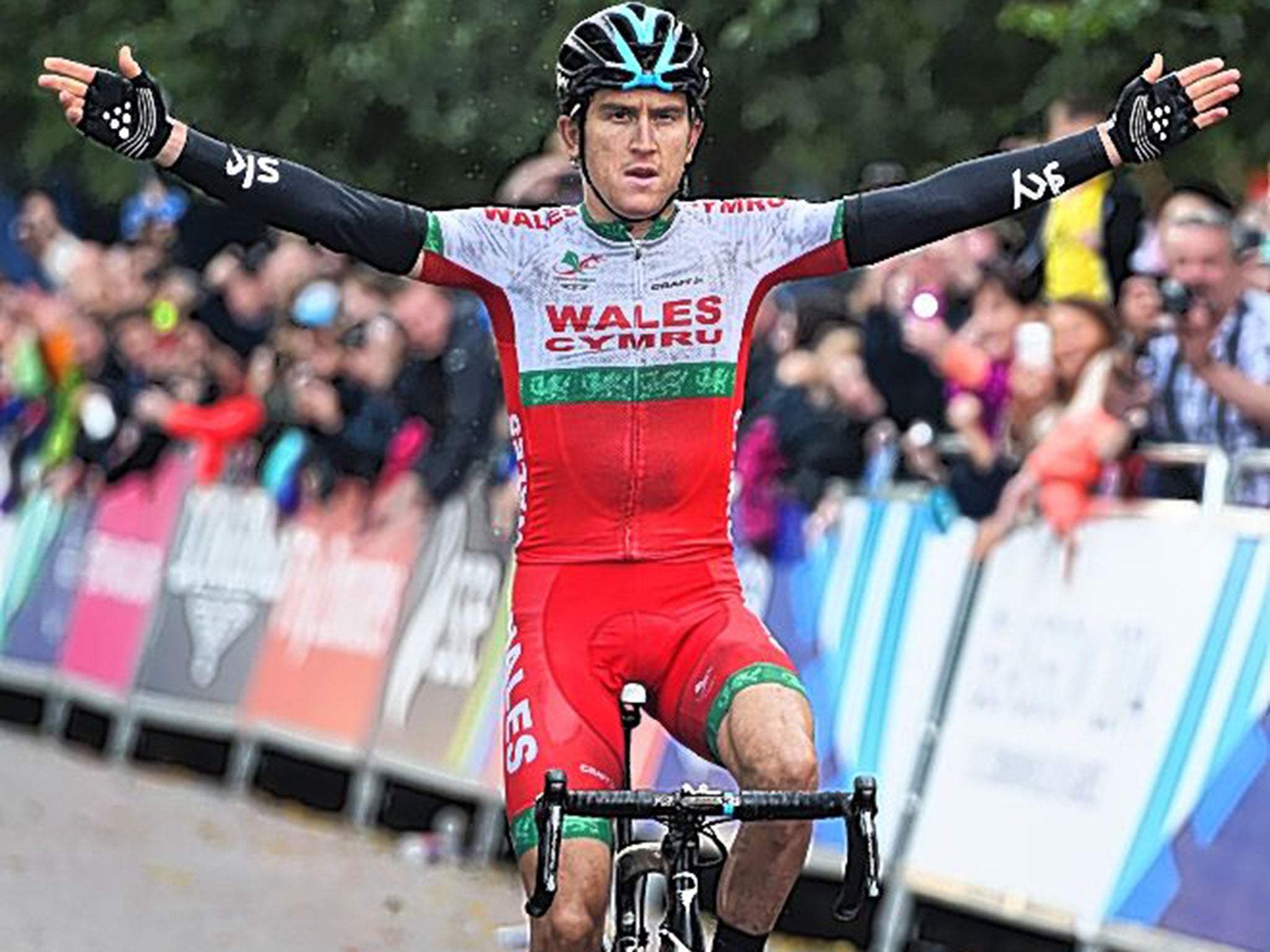 Geraint Thomas, of Wales, celebrates winning road race gold