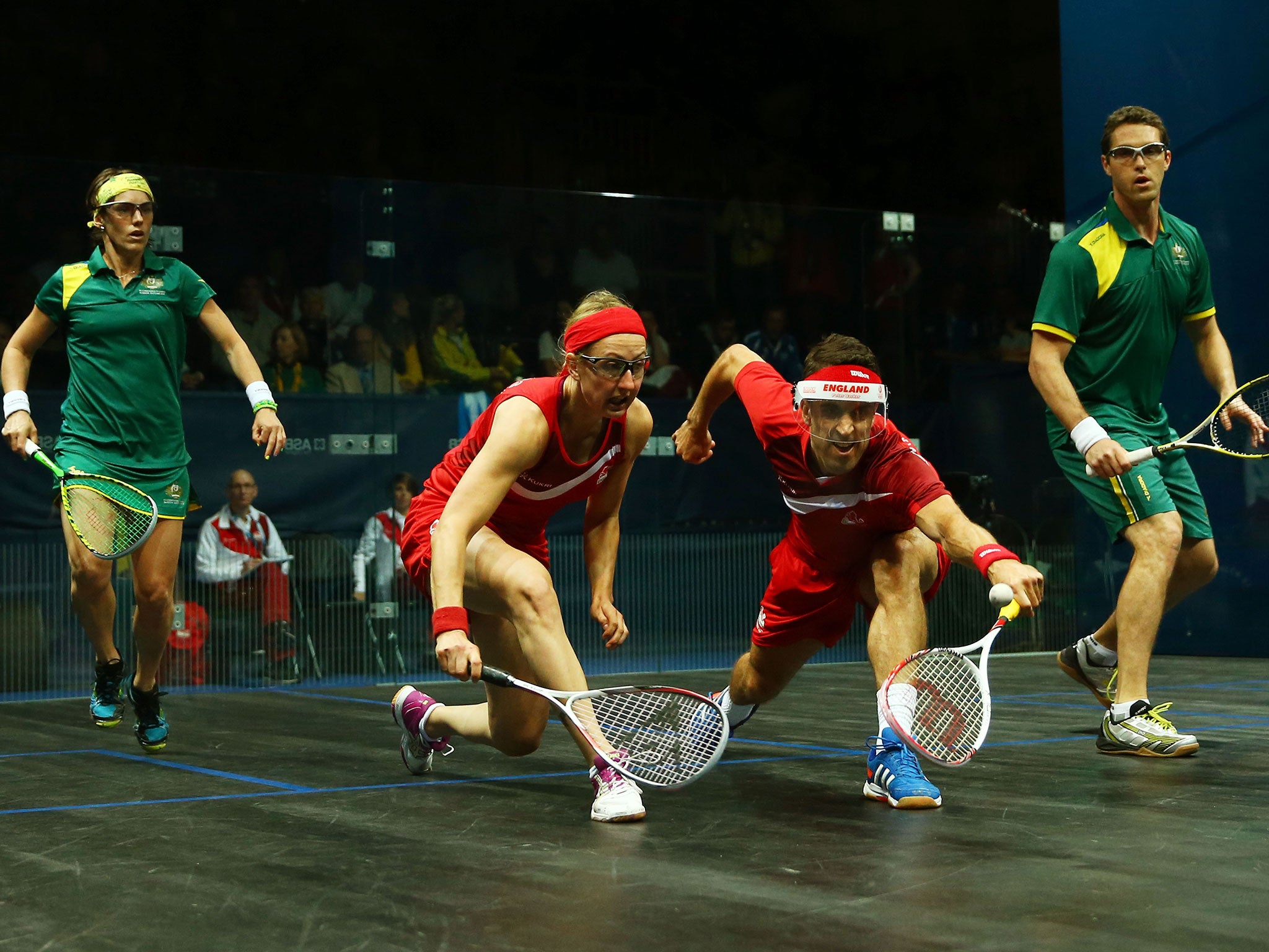 England’s Peter Barker and Alison Waters (red kit) were beaten by David Palmer and Rachael Grinham, of Australia