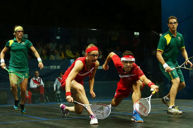 England’s Peter Barker and Alison Waters (red kit) were beaten by David Palmer and Rachael Grinham, of Australia