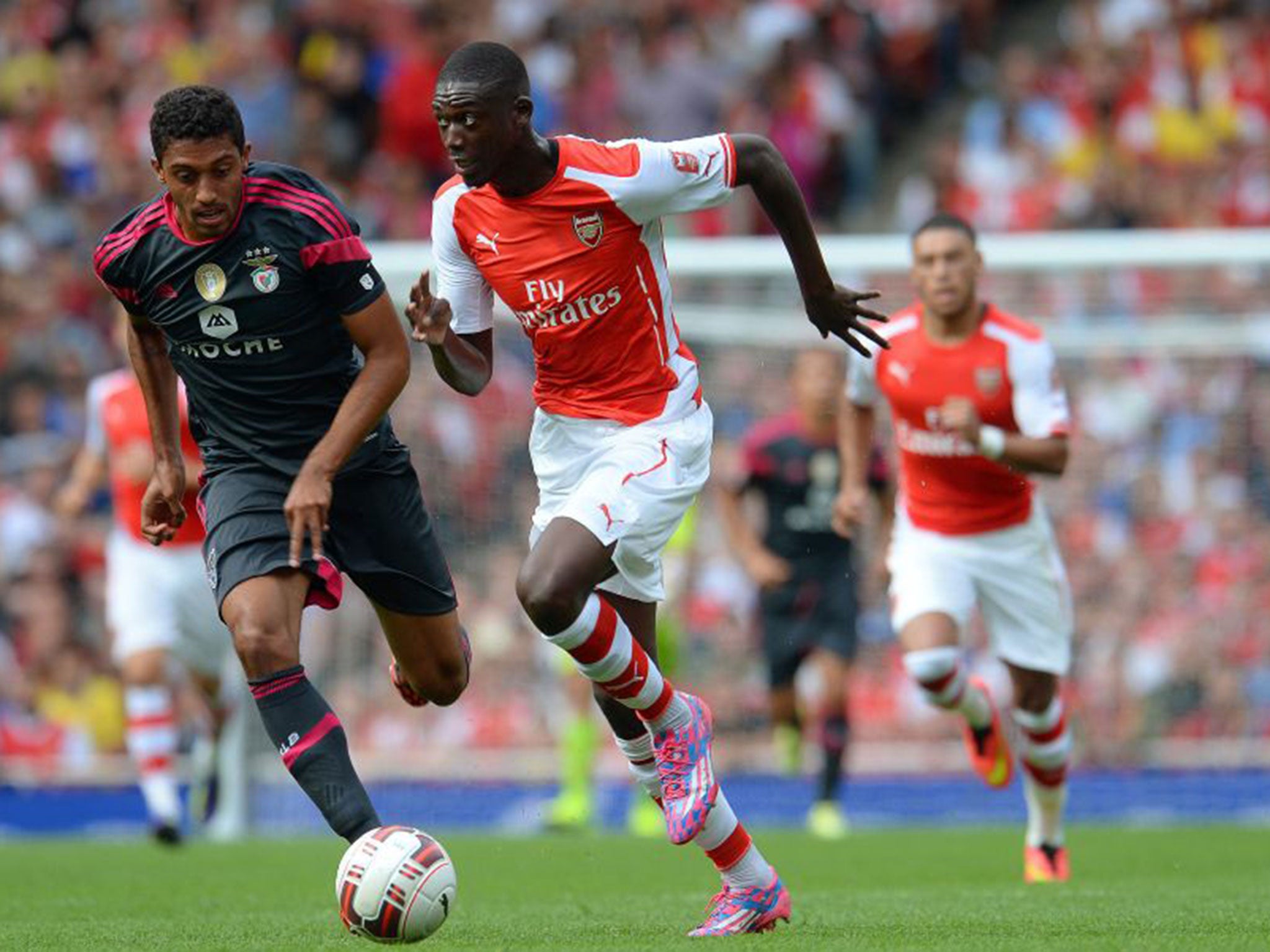 Yaya Sanogo (right) in action for Arsenal