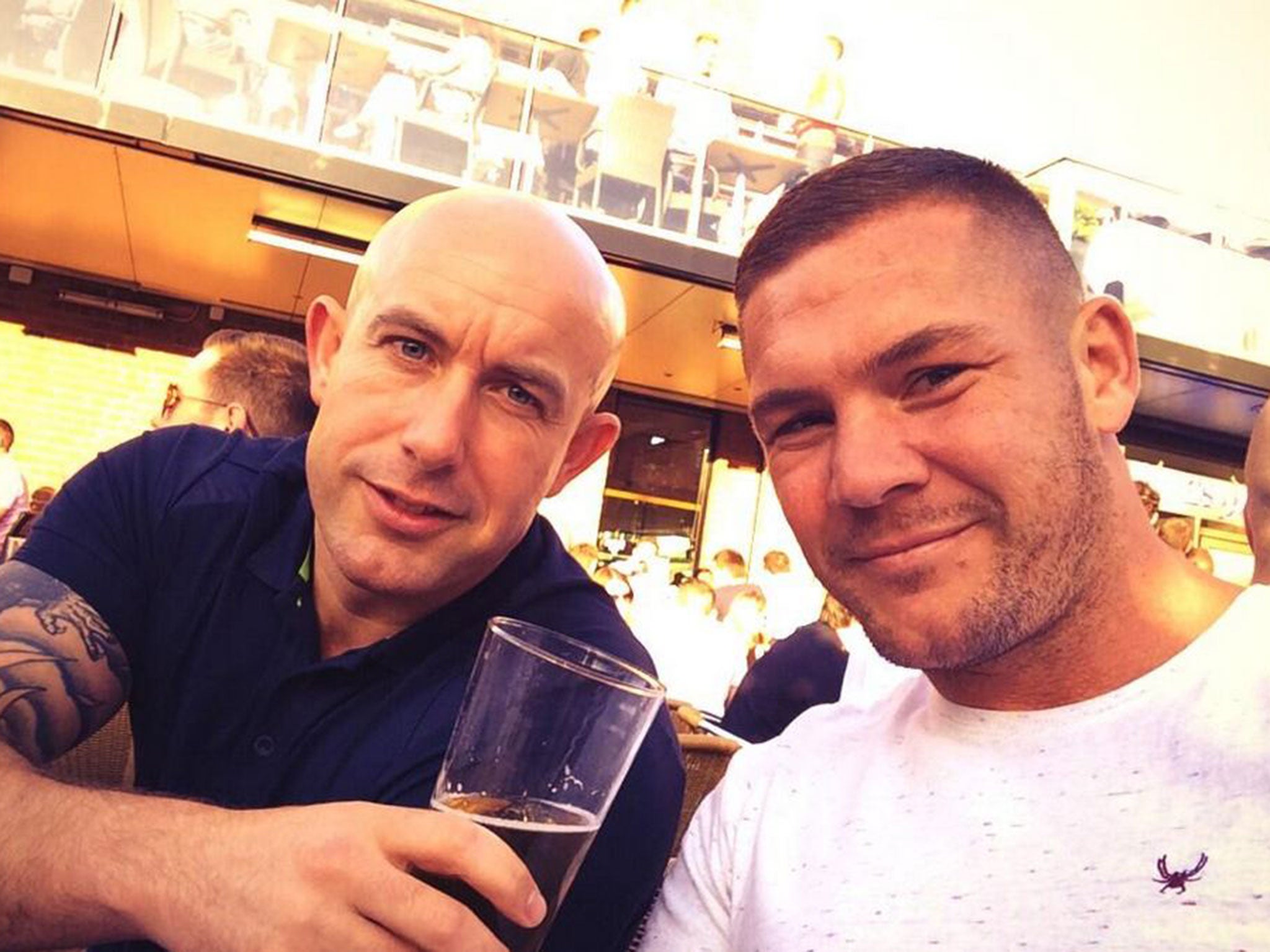 Retired boxer Jamie Moore (right) is in hospital after being shot in an apparent case of mistaken identity