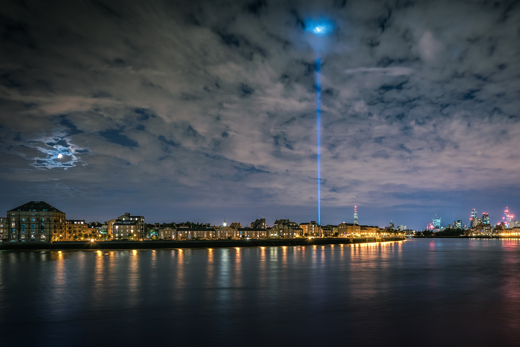 A beam of blue light shoots upwards into the sky in central London as part of an installation commemorating the WW1 centenary