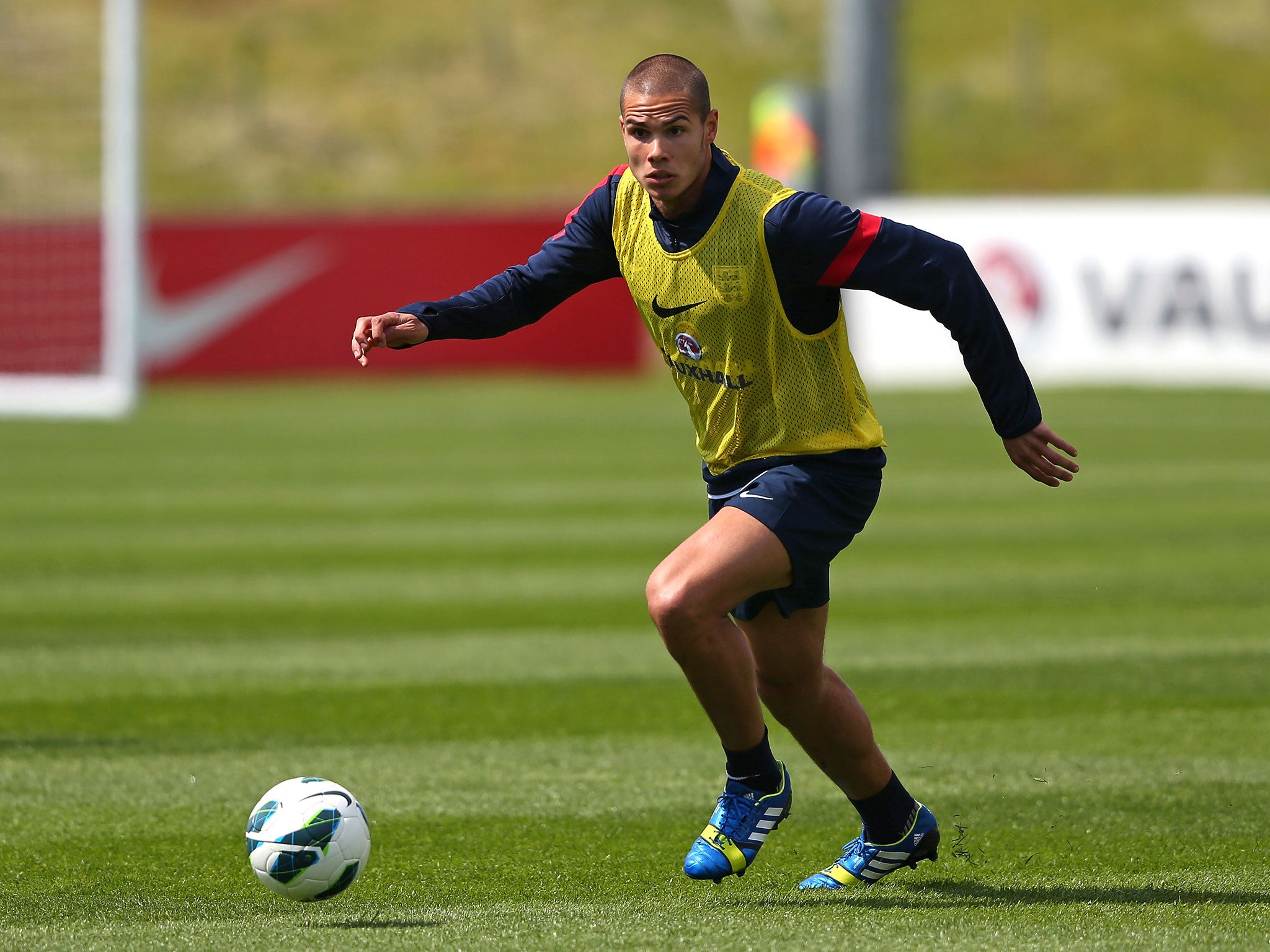 Jack Rodwell of England runs with the ball during a training session at St Georges Park on May 27, 2013 in Burton-upon-Trent, England.