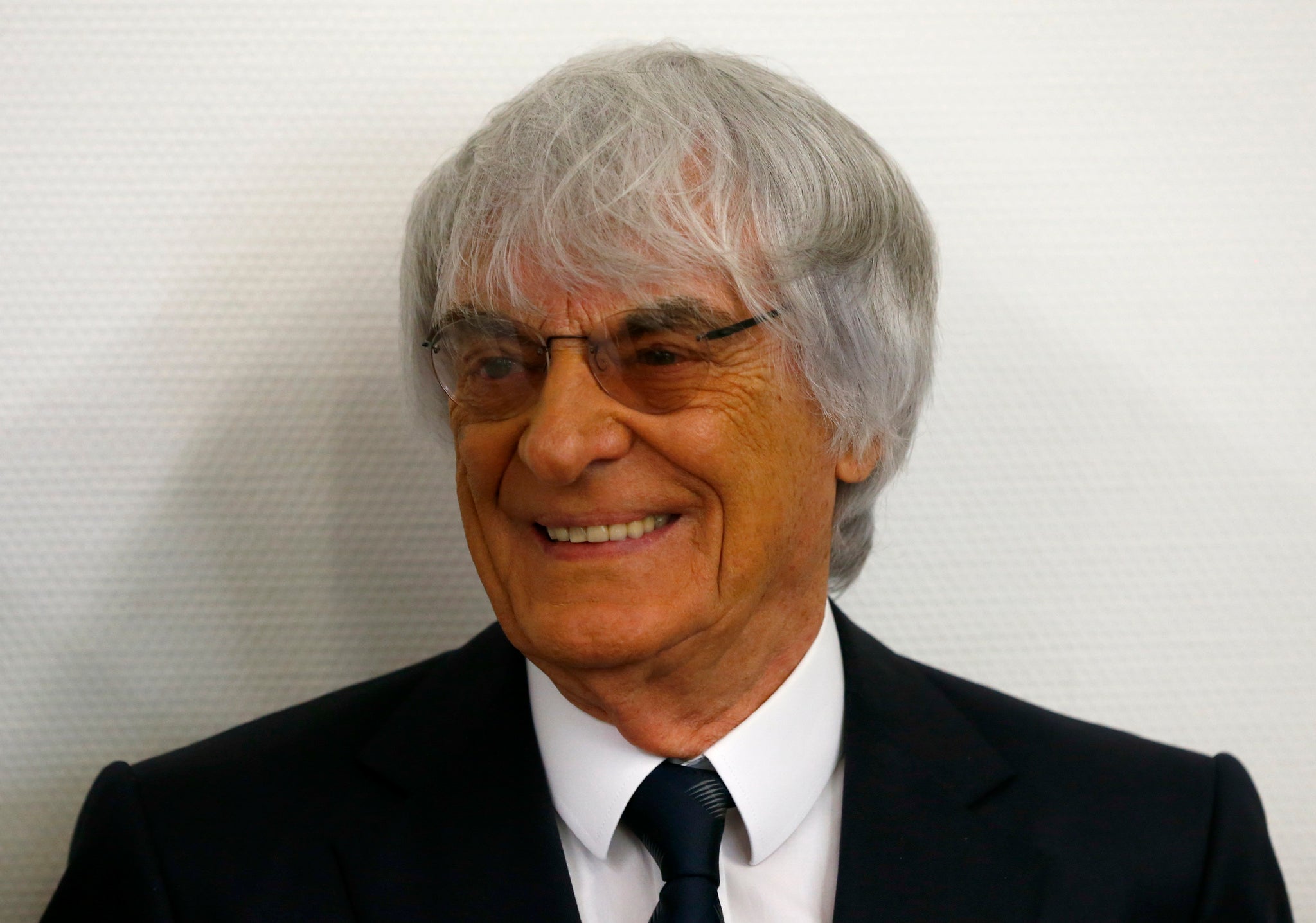 F1 boss Bernie Ecclestone has had his bribery case thrown out of court after making a one-off payment of $100m